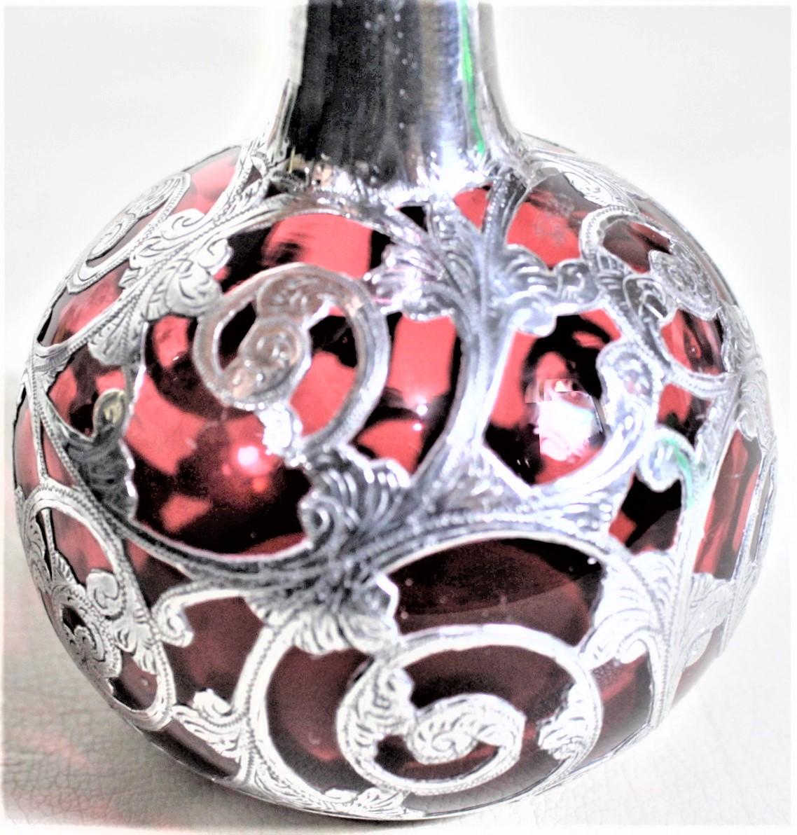 Art Deco Antique Cranberry Glass Perfume or Scent Bottle with Engraved Silver Overlay For Sale