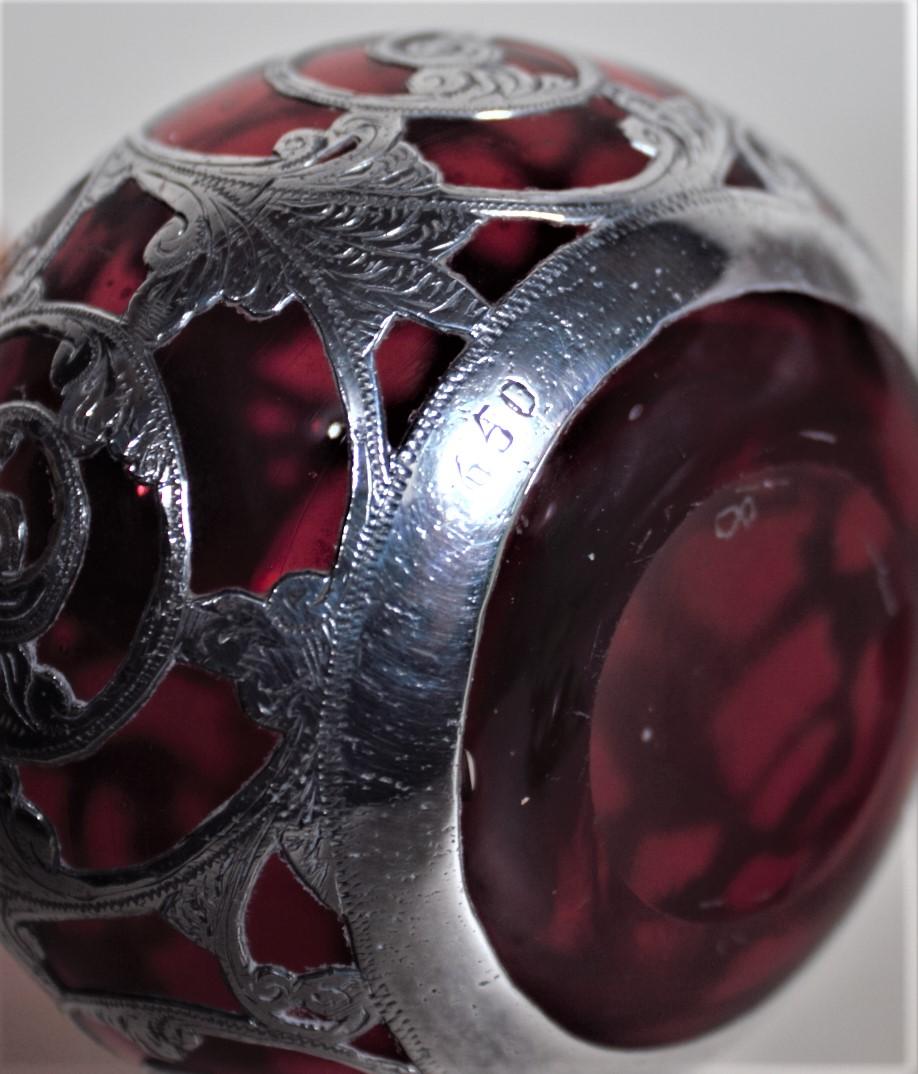 Hand-Crafted Antique Cranberry Glass Perfume or Scent Bottle with Engraved Silver Overlay For Sale