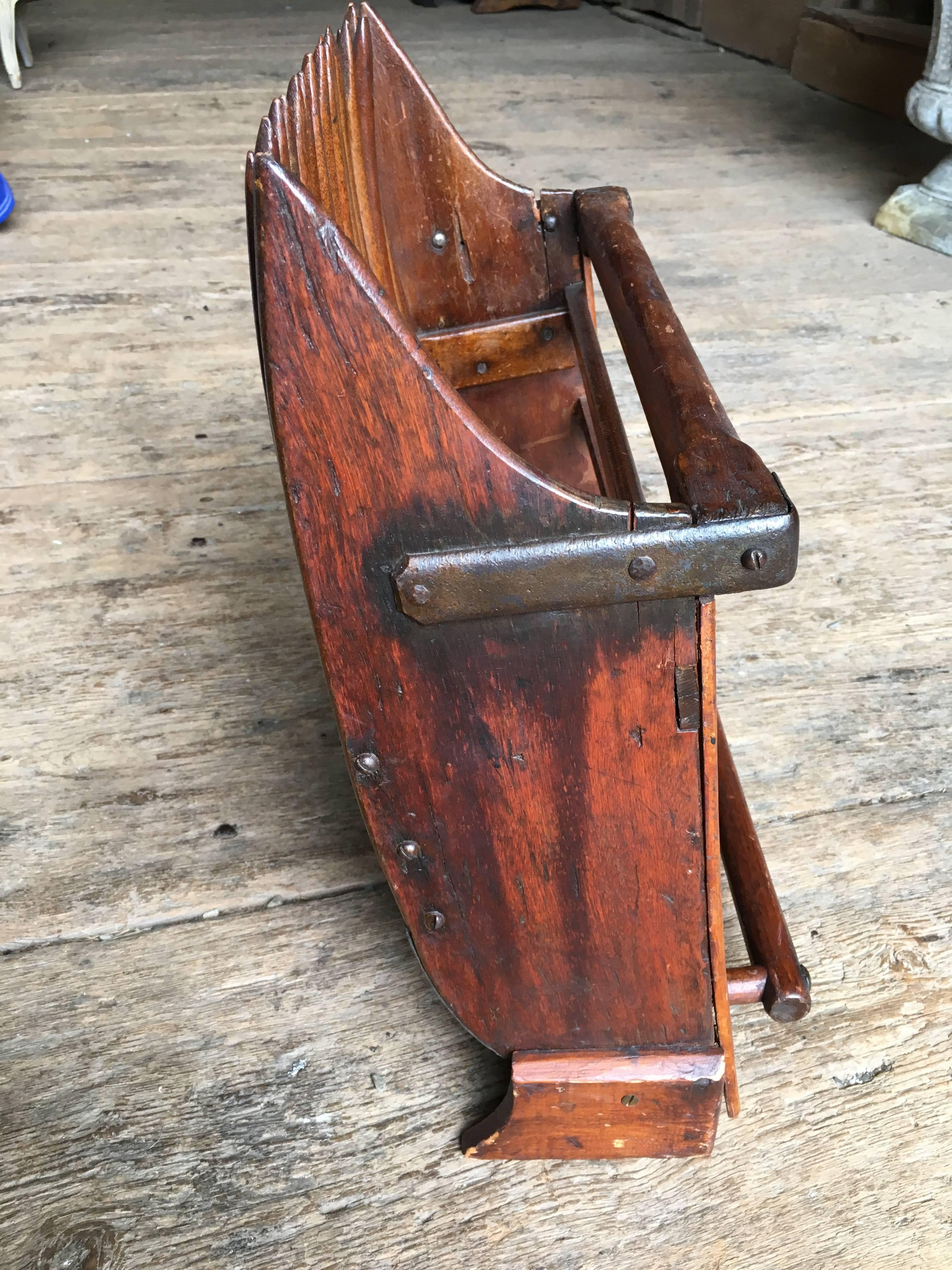 antique cranberry rake