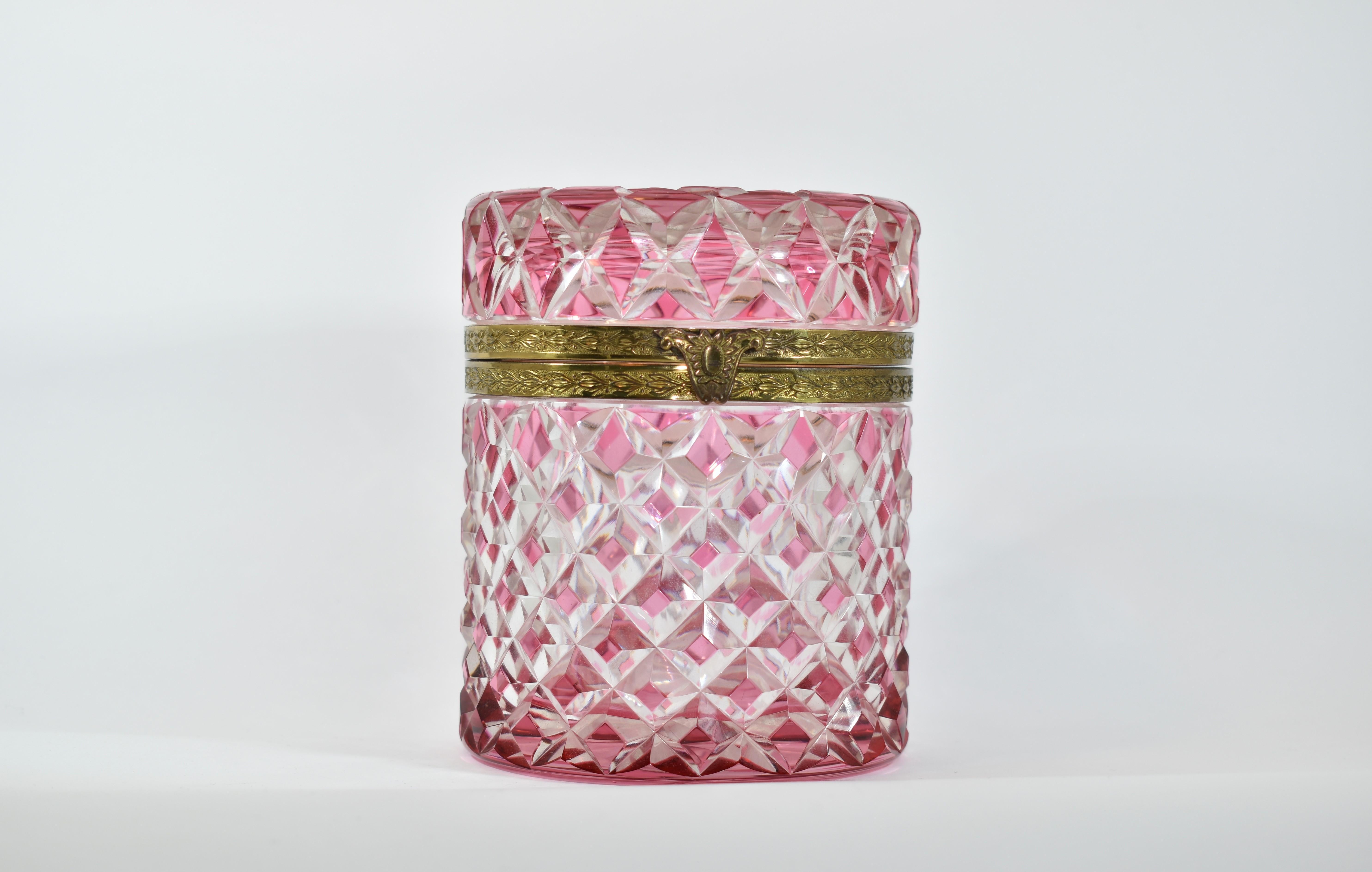 Antique richly cut crystal glass box with cranberry overlay
gilded bronze mounts
Cut with a Star Pattern Underneath.