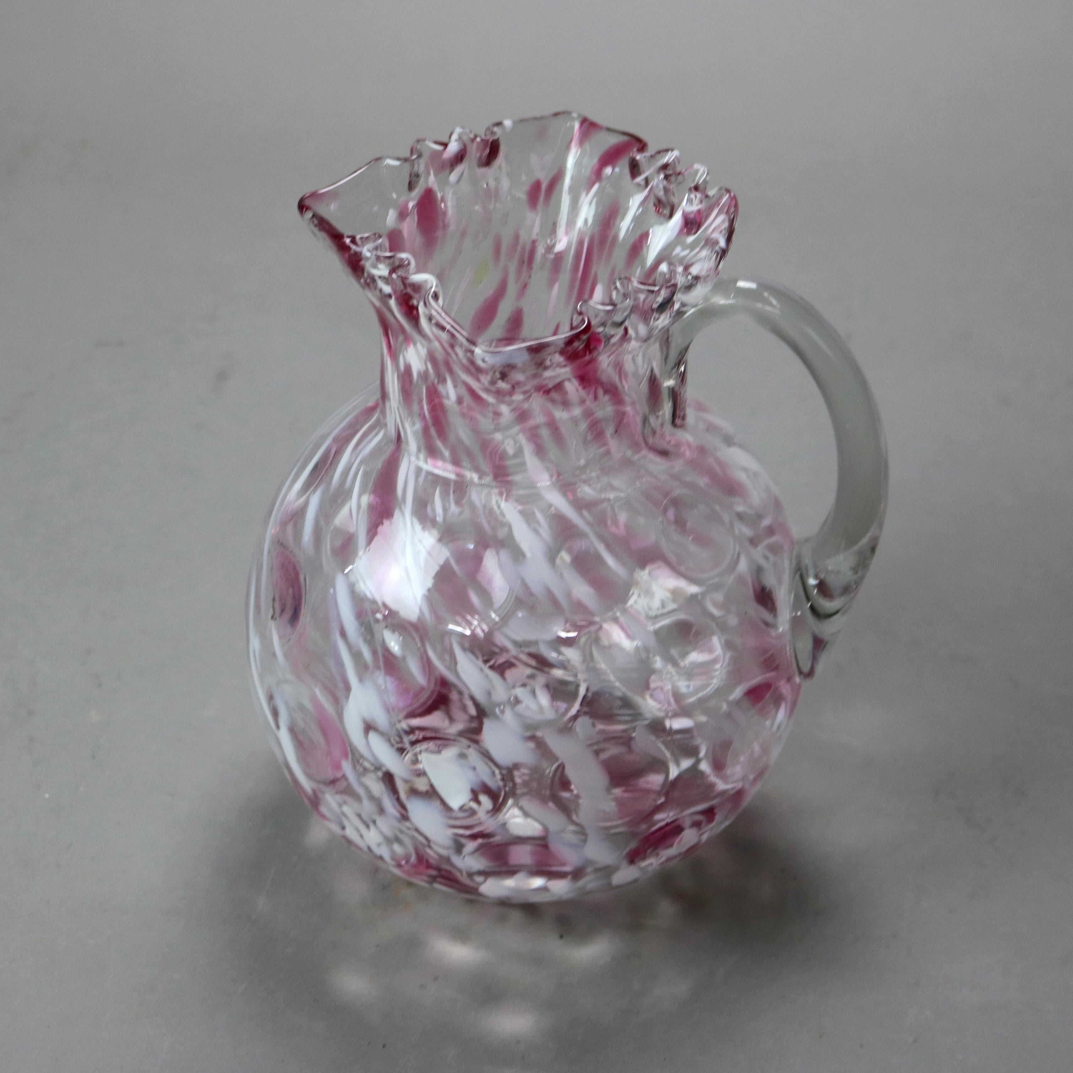 Antique Cranberry Spatterware Coinspot Ruffle Top Glass Water or Juice Pitcher with Applied Handle C1890

Measures - 8 1/4
