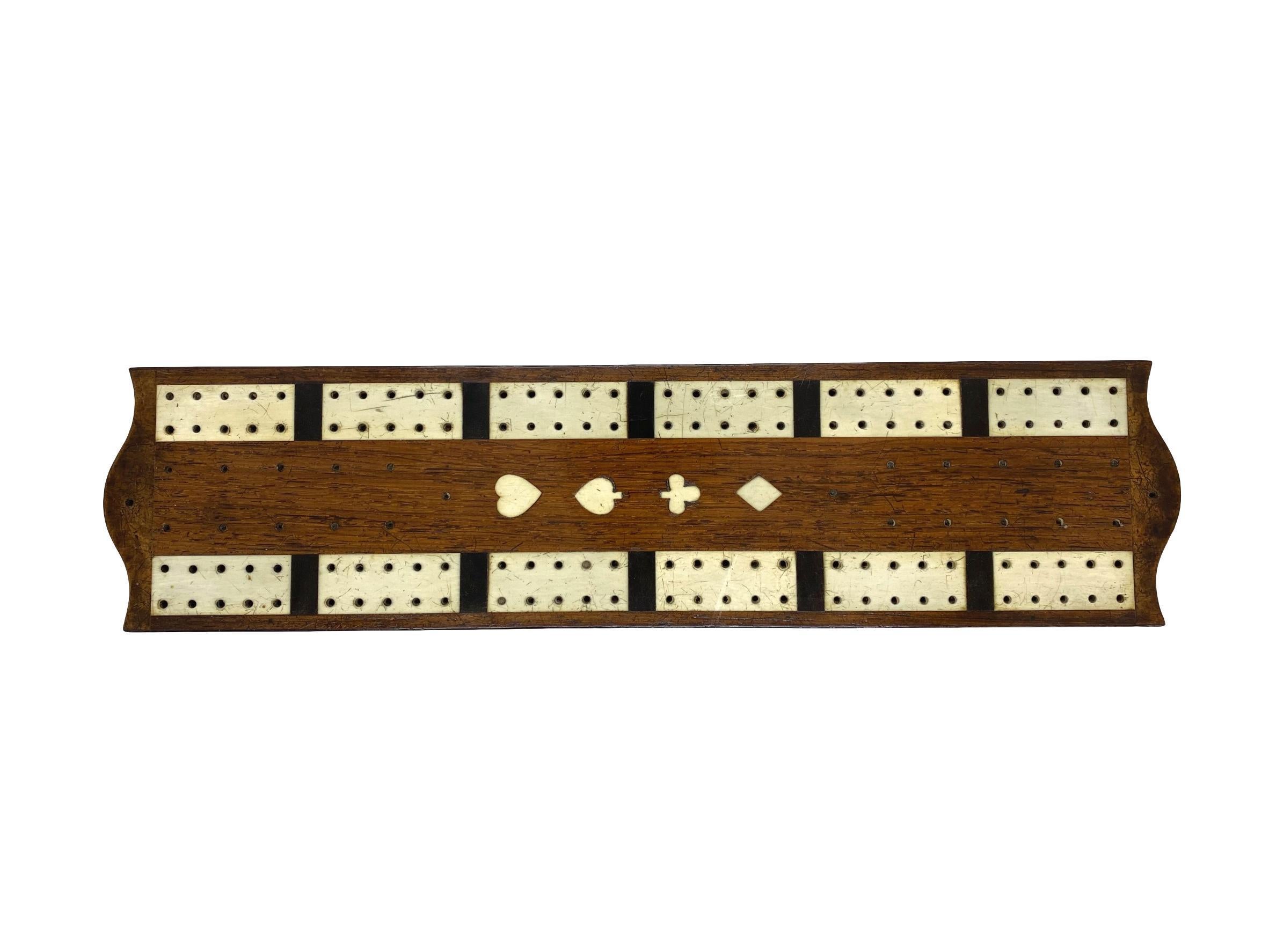 Antique cribbage board and box in mahogany with exotic inlays, English, circa 1880.