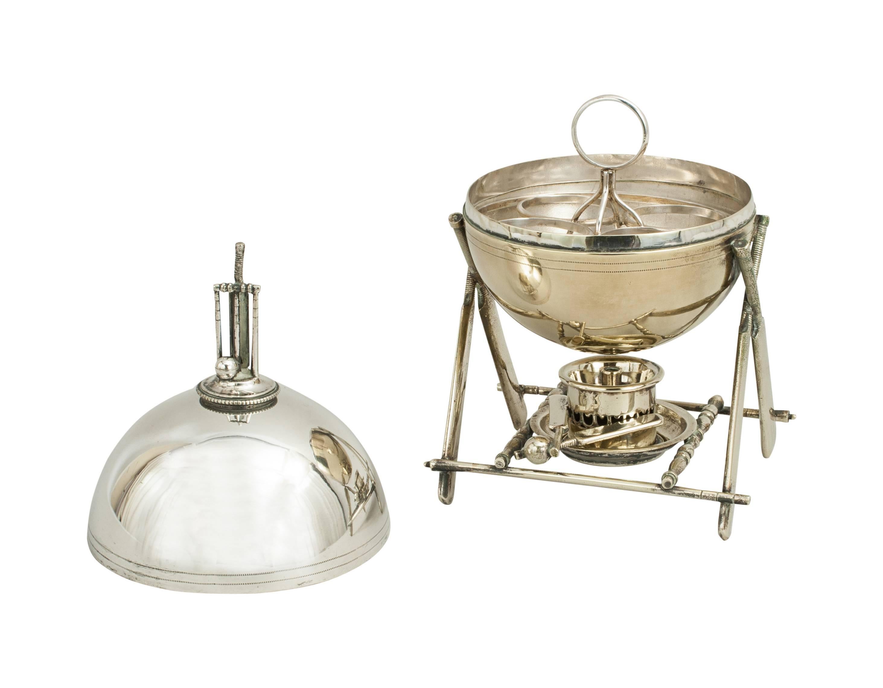 Rare cricket themed egg steamer
The silver plate egg steamer, boiler (or egg coddler) is in the shape of a cricket ball. The steamer can be used to boil or coddle one or more eggs. The cricket ball contains a four ring frame for holding the eggs