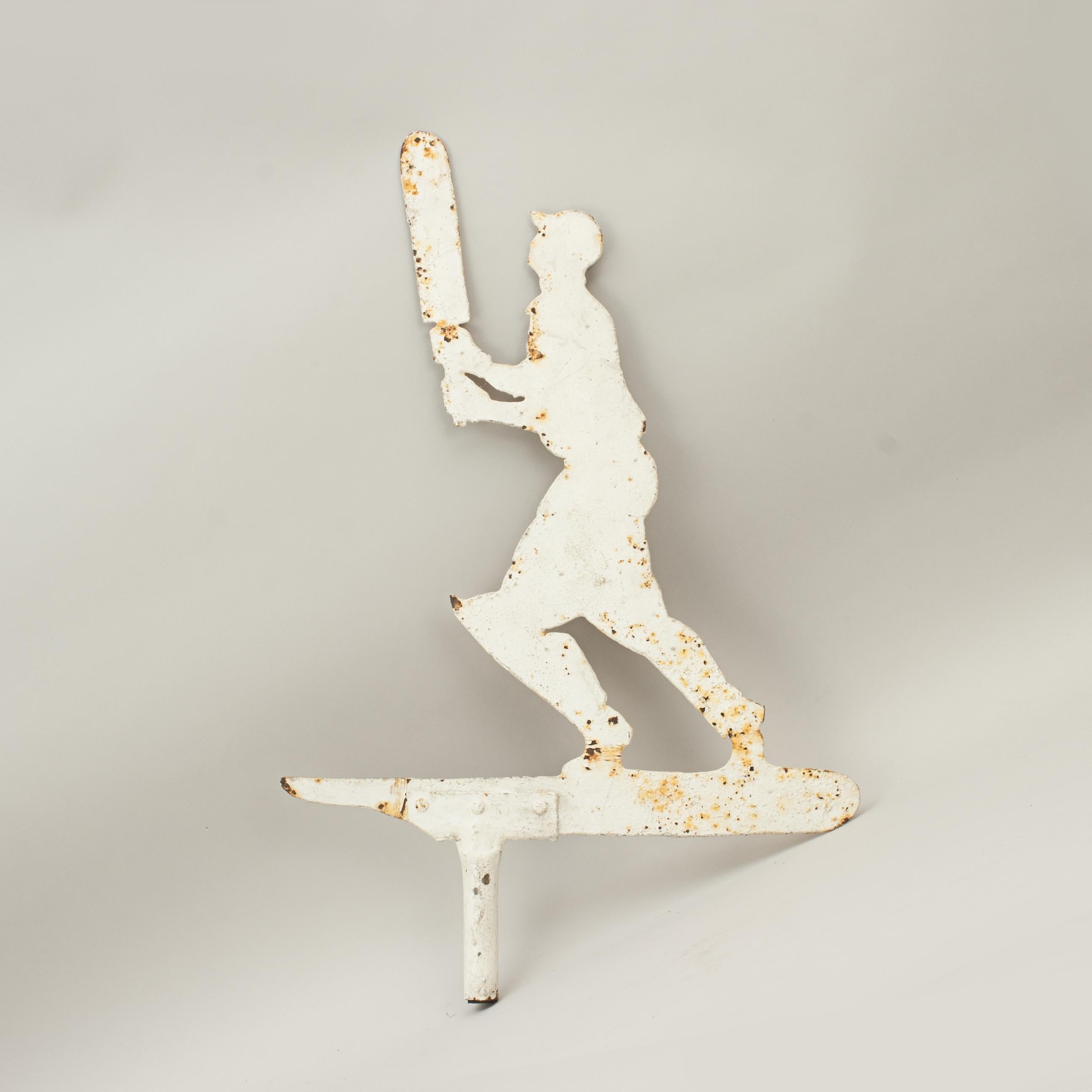 Cricket Batsman Weather vane.
A fine weathervane in the shape of a cricketer, batsman with pads and cricket bat. The cricketer has been mounted onto a turned circular ebonized wooden base. It could easily be reinstalled as a working weather