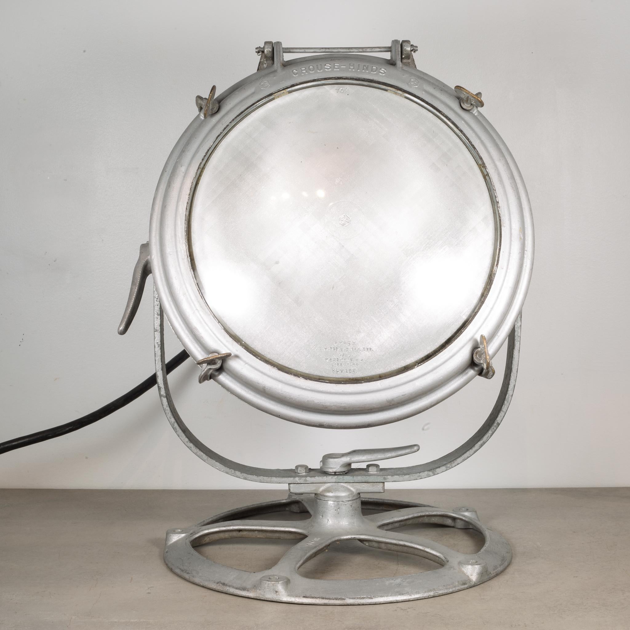 About:

This is an original U.S. Navy spot light by Crouse Hinds. It has a fully adjustable head that tilts and swivels. It is mounted on a round base with a diffused, glass Pyrex lens. 

Creator: Crouse Hinds, U.S.A.
Date of manufacture: circa
