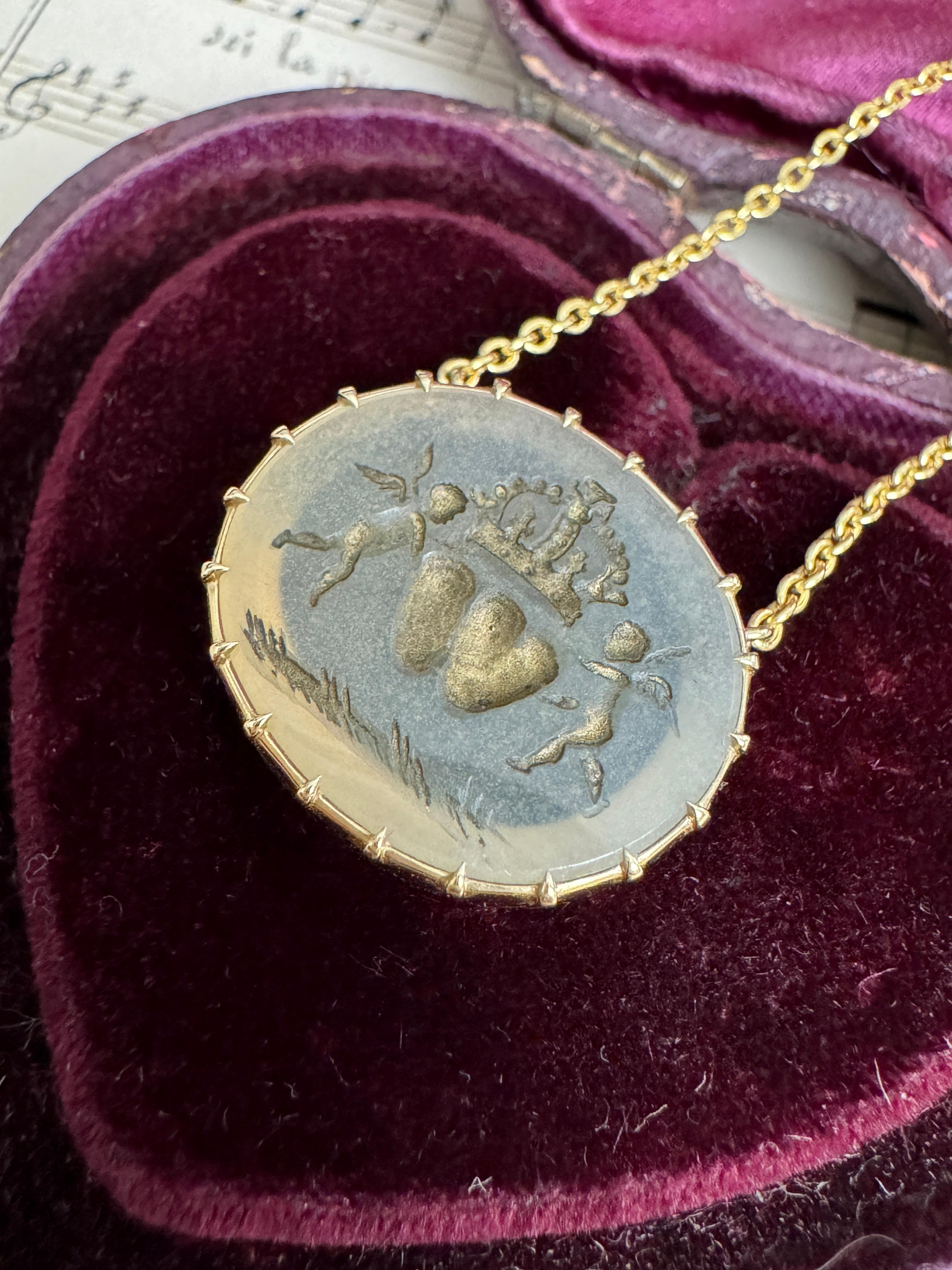 This romantic and pristine early 19th century chalcedony intaglio has been hand-carved in painstaking detail depicting two hearts nestled side-by-side, expressing everlasting love and marriage, as the two hearts are together as one. The hearts are
