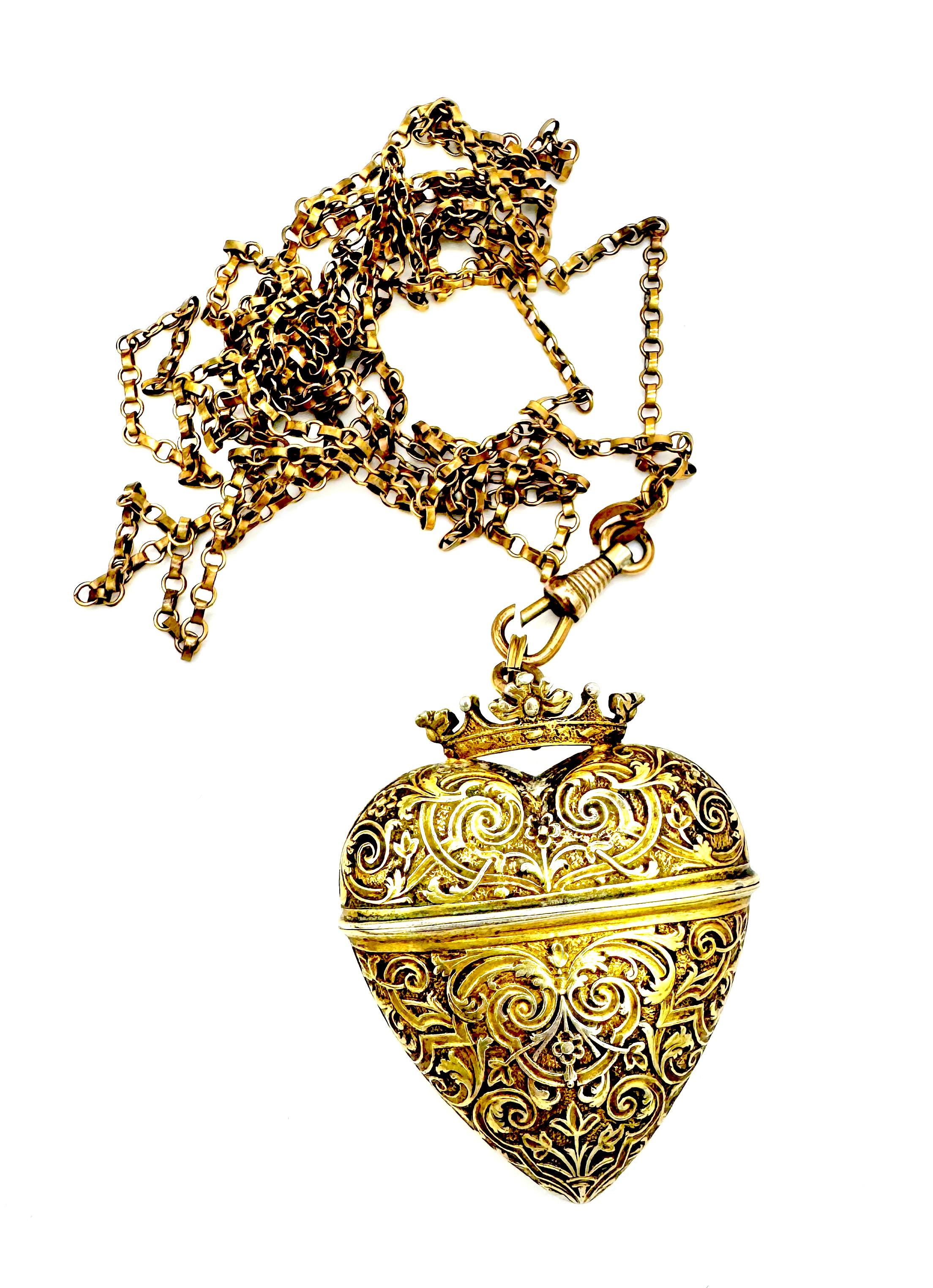 This wonderful Victorian crowned silver heart pendant was created in the middle of the 19th century. The heart is a box that can be used to hold treasures and souvenirs or folded letters. Alternatively, it can be used as a vinaigrette. It comes on a