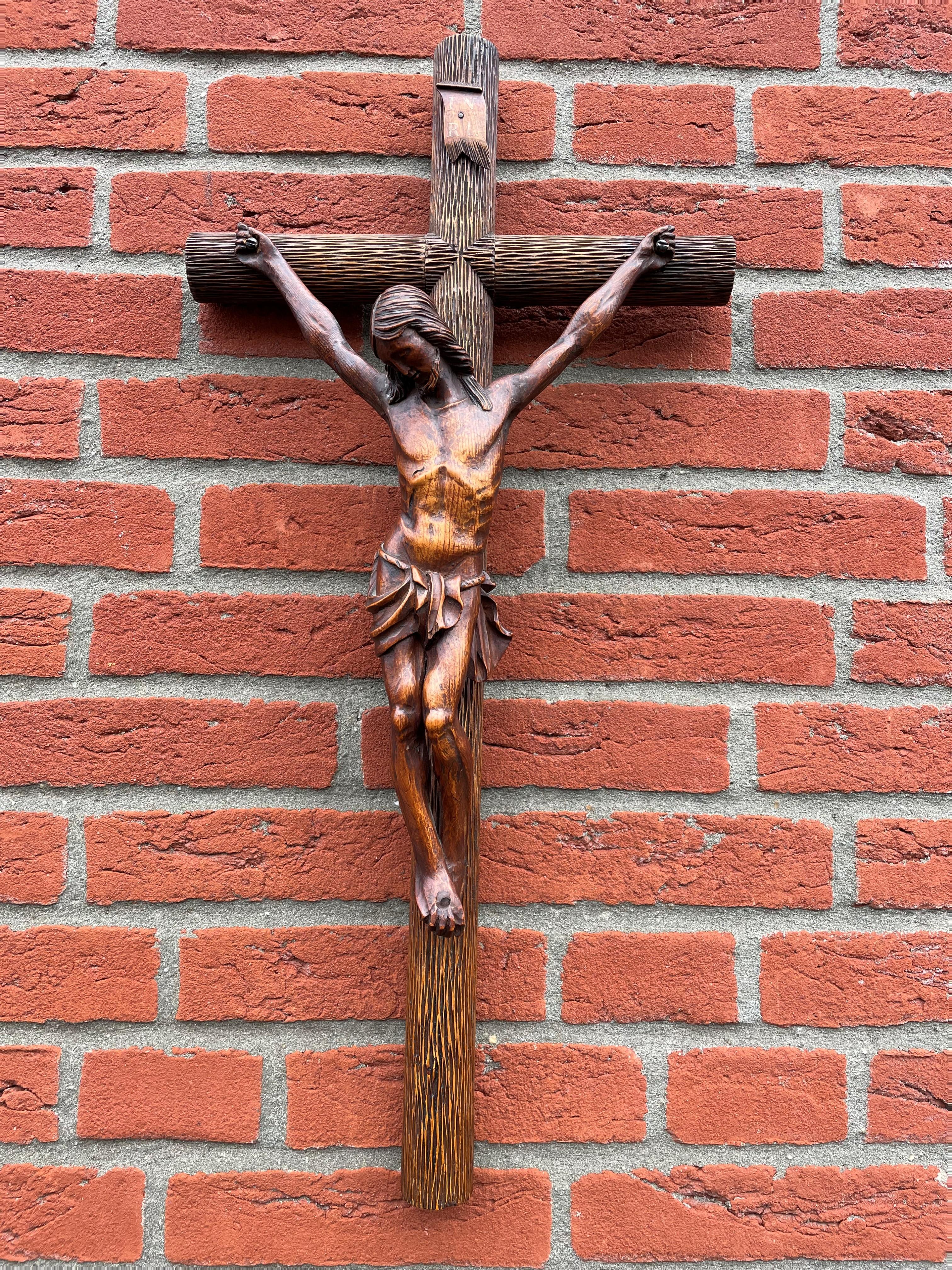 Unique and perfectly balanced crucifix with a marvelous cross and a detailed corpus of Jesus.

This unique design crucifix comes with an incredibly detailed and top quality carved, circular, tree trunk-like cross. We have never seen such a cross