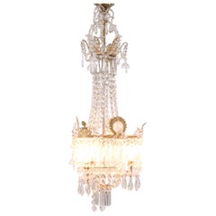Antique Crystal Chandelier in Gilt Bronze with Louvre Style Decorations 1890s