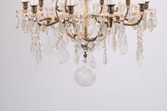 Antique Crystal Chandelier in Gilt Bronze with Louvre Style Decorations 1920s