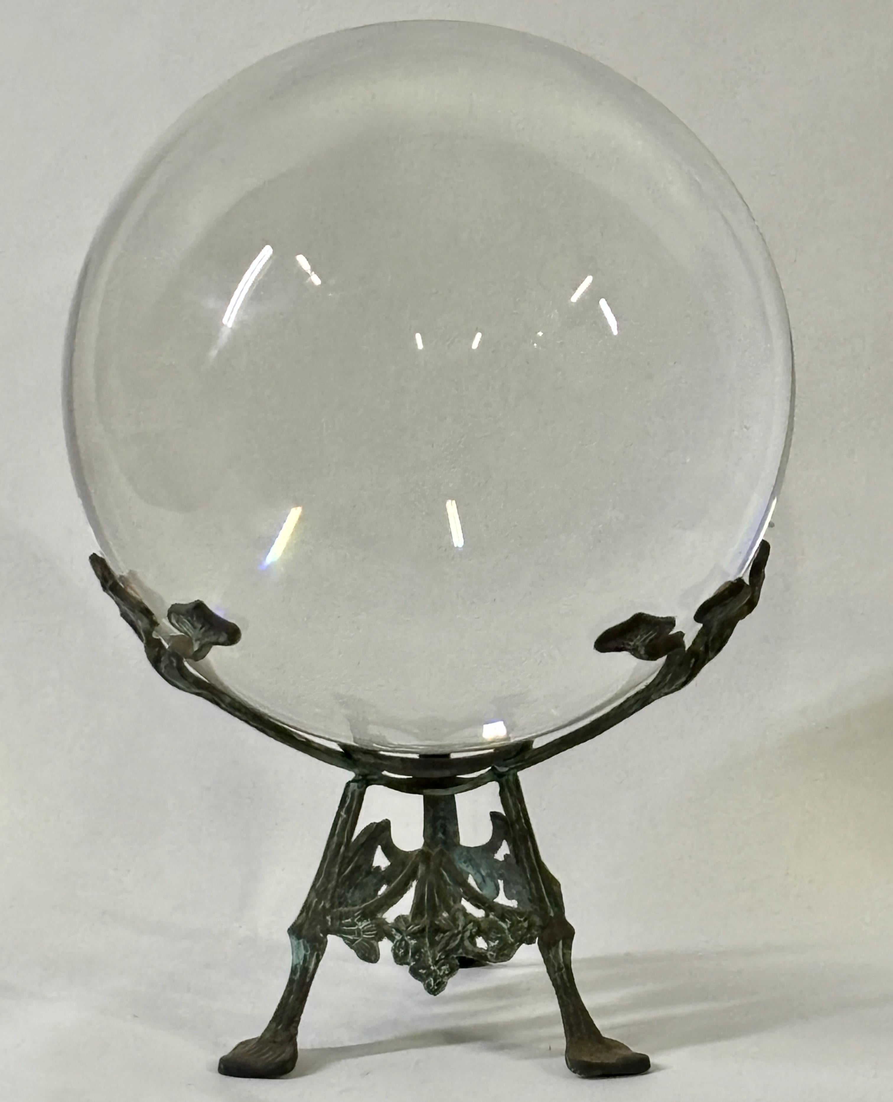 A large solid crystal glass orb ( 10
