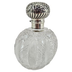 Antica bottiglia di profumo in cristallo con tappo in argento sterling