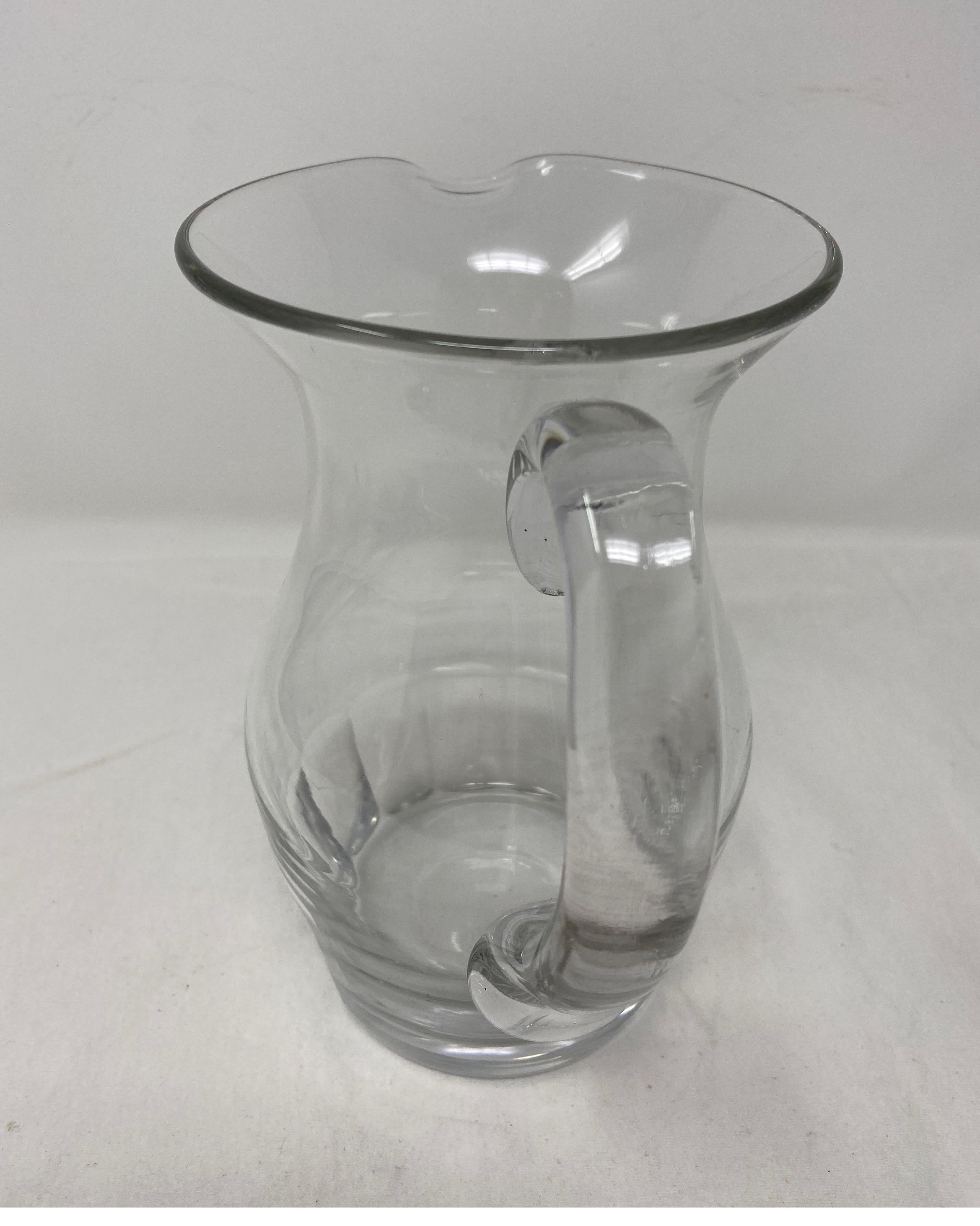 Antique crystal pitcher. 19th century.
6.5