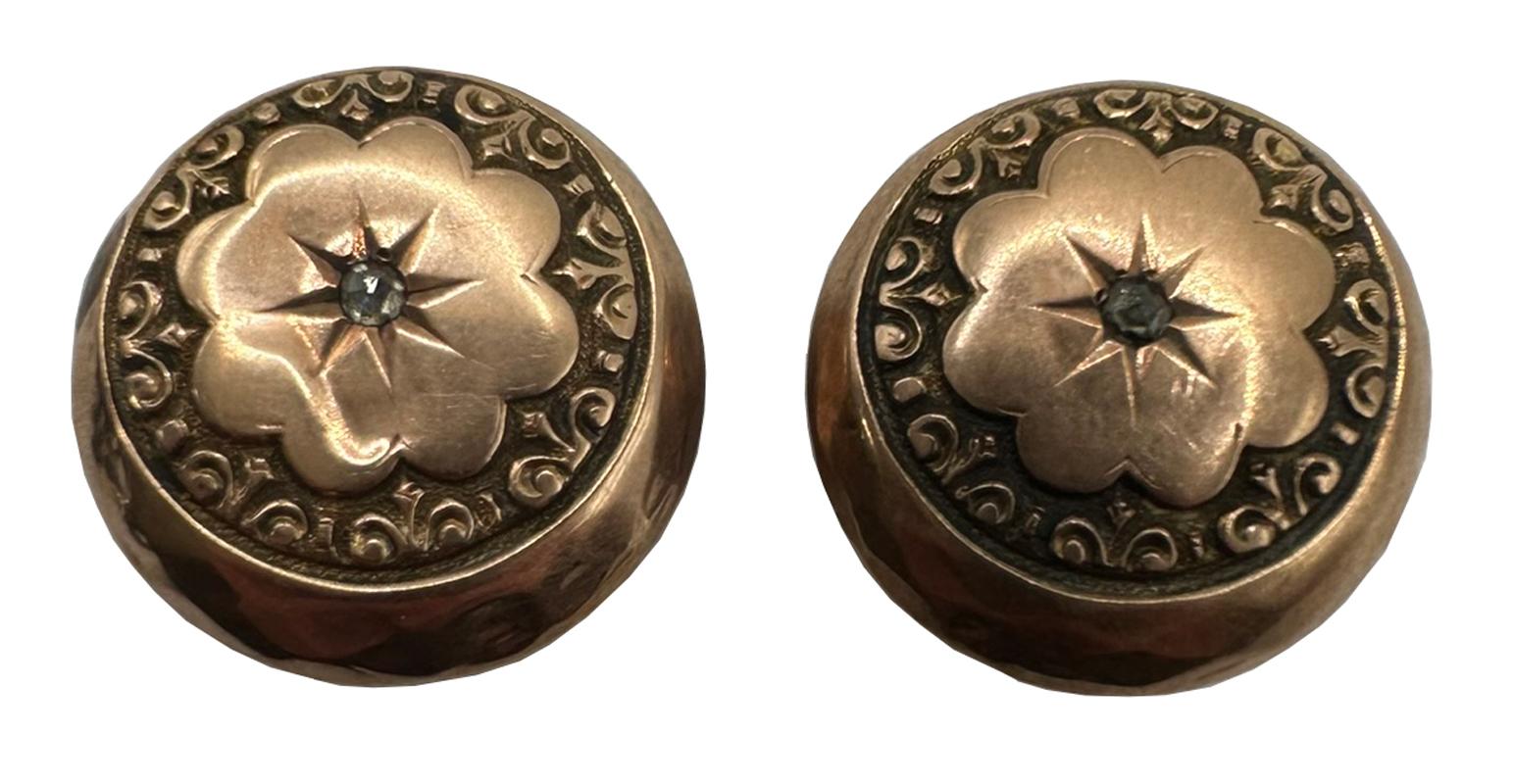 2. Antique Cufflinks with Diamond Pair
Each 0.84” dia (21.3mm) x 0.39” d  (9.9mm)
Each 0.135 oz (3.9g)
Late 1800’s round gold cufflinks with a diamond center. The center diamond is surrounded by a carved flower amidst delicately carved designs. The