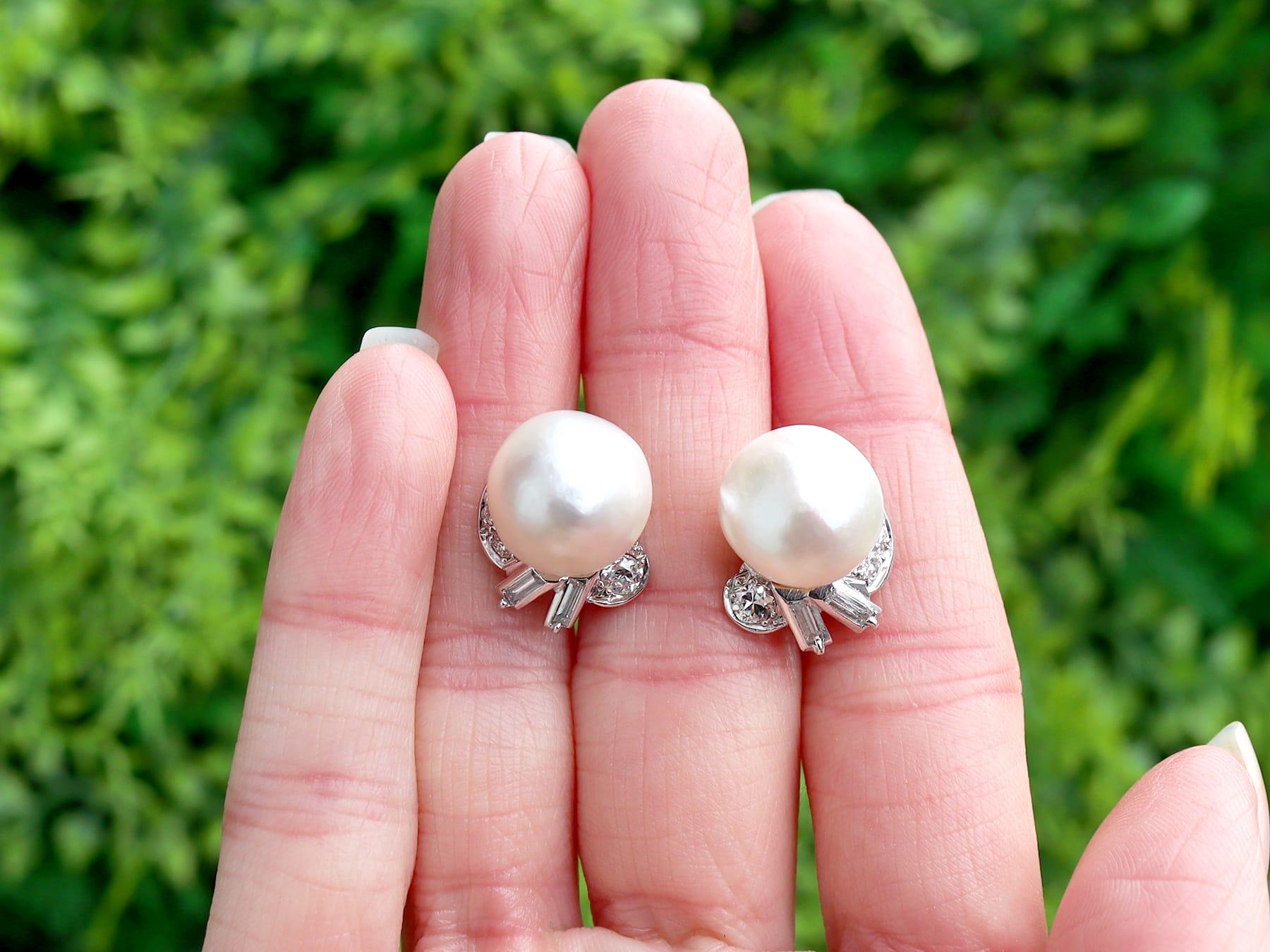 A fine and impressive pair of antique 1930s cultured pearl and 1.10 carat diamond, platinum earrings with 18 karat white gold screw back fastenings; part of our diverse vintage estate jewelry collections.

These fine and impressive antique pearl and