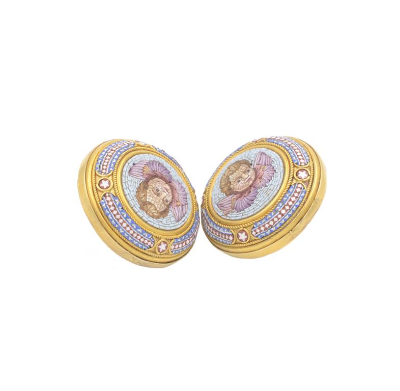 Antique cupid micro mosaic earrings from circa 1900 in 18 karat yellow gold. These incredible earrings were originally shirt buttons that were later converted to very wearable discs earrings with a post and clutch.  The micro mosaic design is