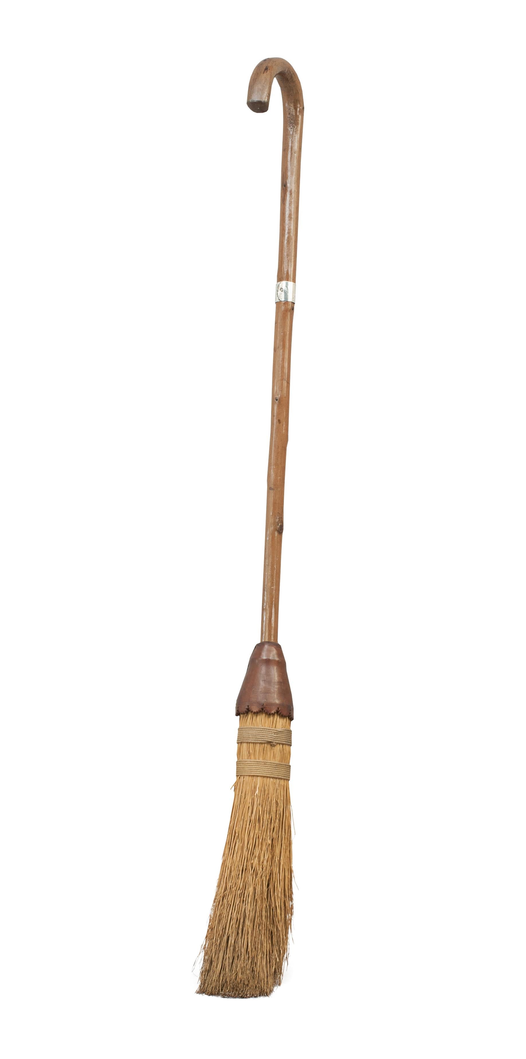Vintage Curling Besom.
A scarce curling besom, brush or broom with a briarwood handle with an engraved silver band. The besom was awarded as a tournament prize and the engraving reads 