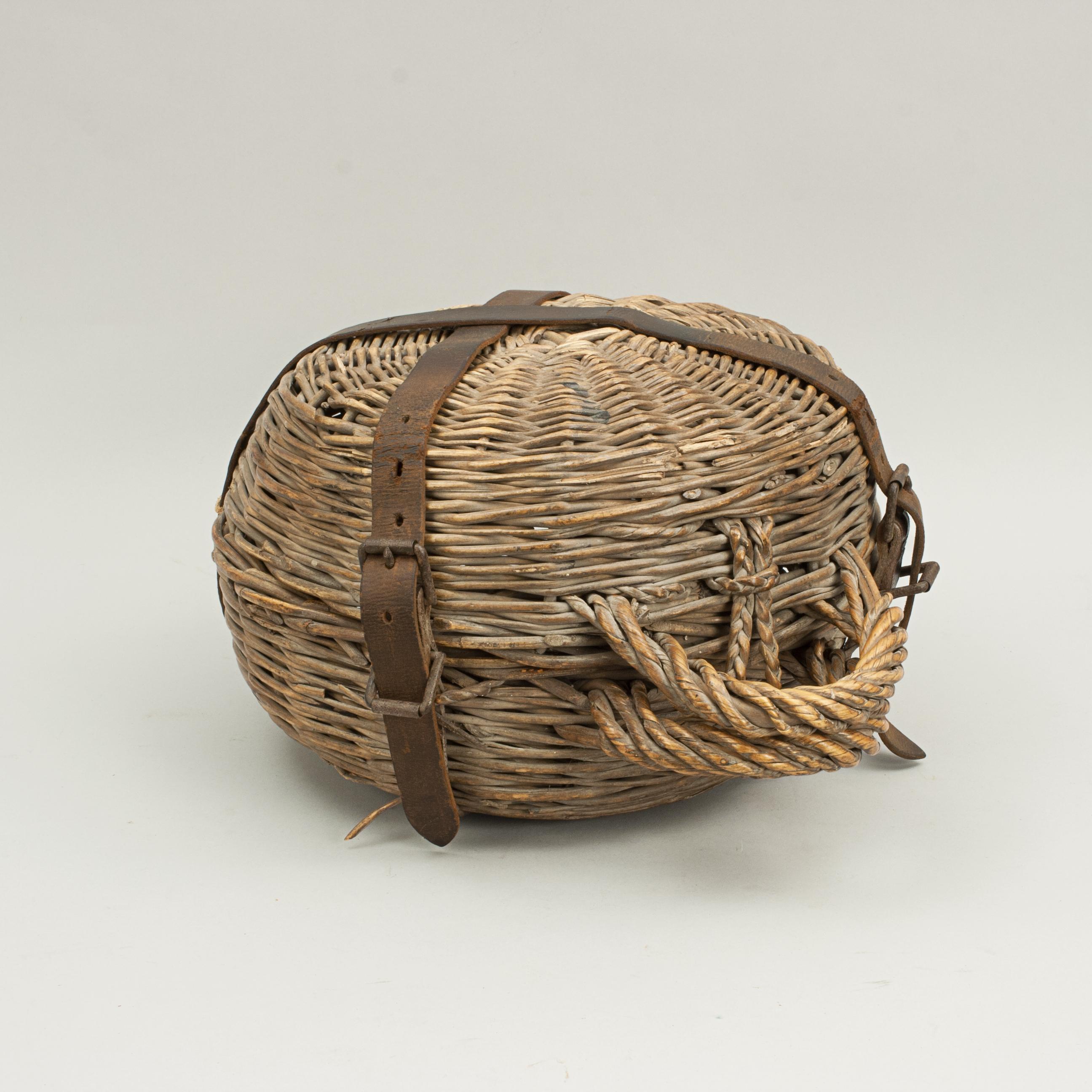 Curling stone with wicker case.
A late 19th or early 20th century double - soled, machine - made curling stone, rare to find with original wicker carry case. The wicker 'container' was used to protect and carry the curling stone, the handle would