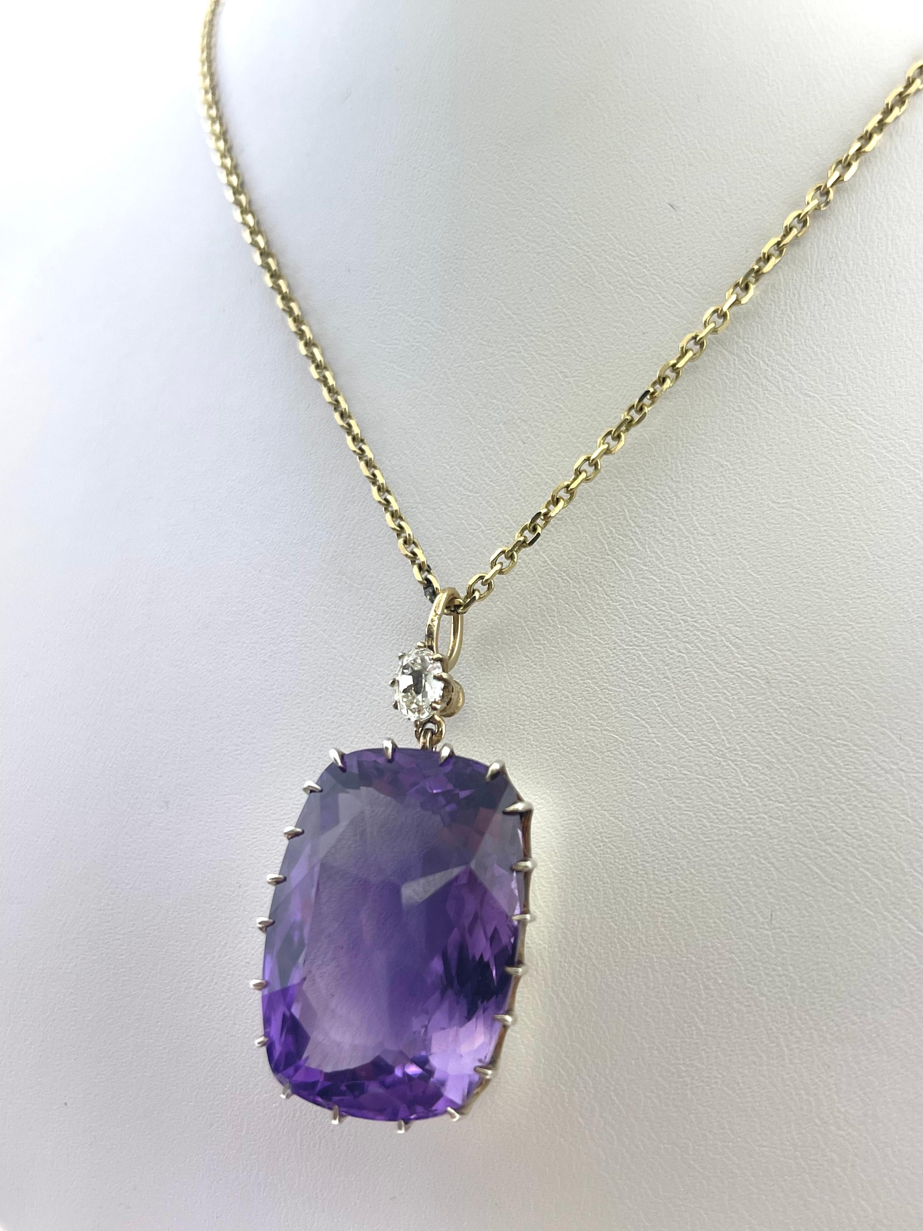 A big and beautiful antique cushion cut amethyst pendant with a oval diamond on top is something that you don't want missing from your collection! 

This one is for the books and you don't want to miss out! 