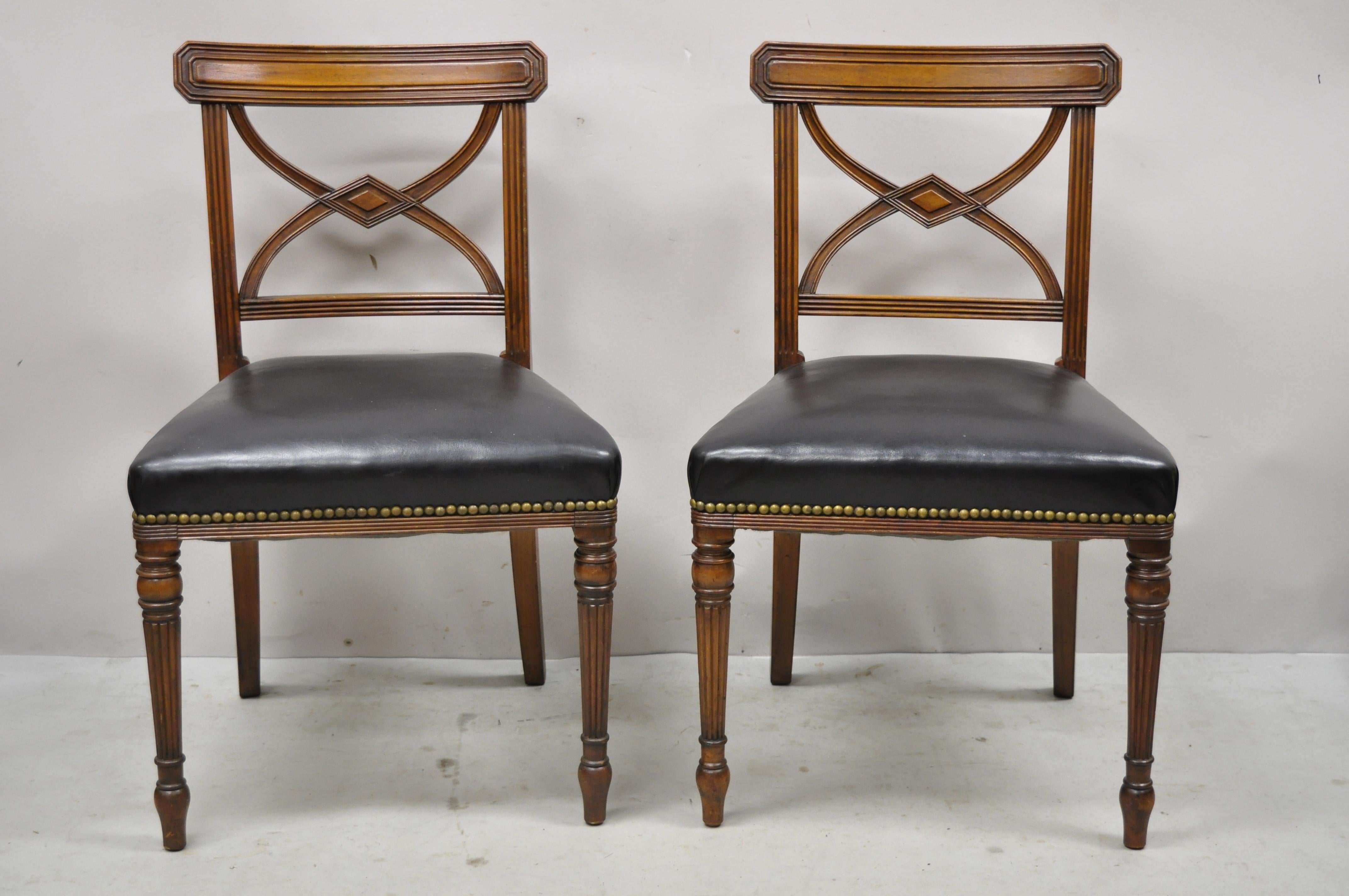 Antique custom English regency solid mahogany black leather side chair - a pair. Item features solid wood construction, black leather upholstery, nicely carved details, tapered legs, very nice vintage pair, quality English craftsmanship, great style