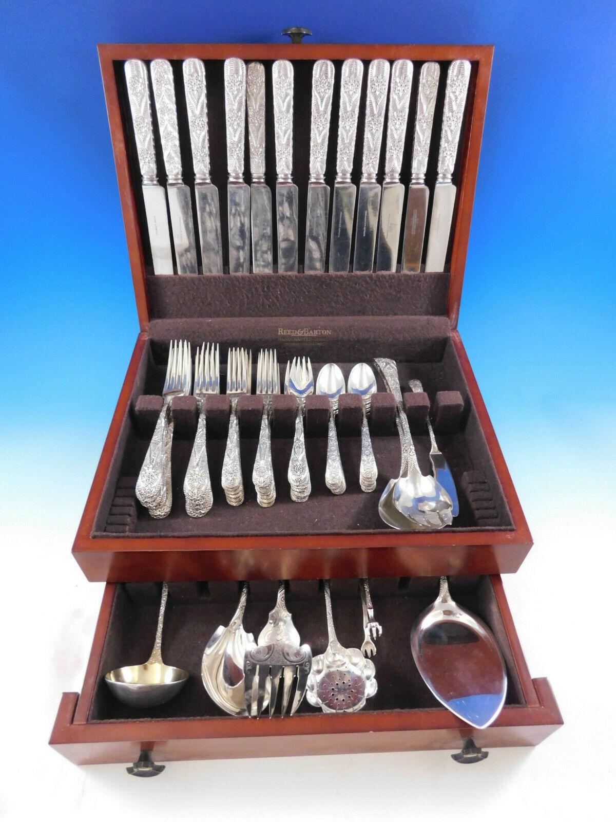 Exceedingly rare antique engraved aka custom engraved by Tiffany & Co. sterling silver flatware set with intricately hand engraved design, 62 pieces. This set includes:

12 large banquet knives with blunt plated blades, 10 1/2