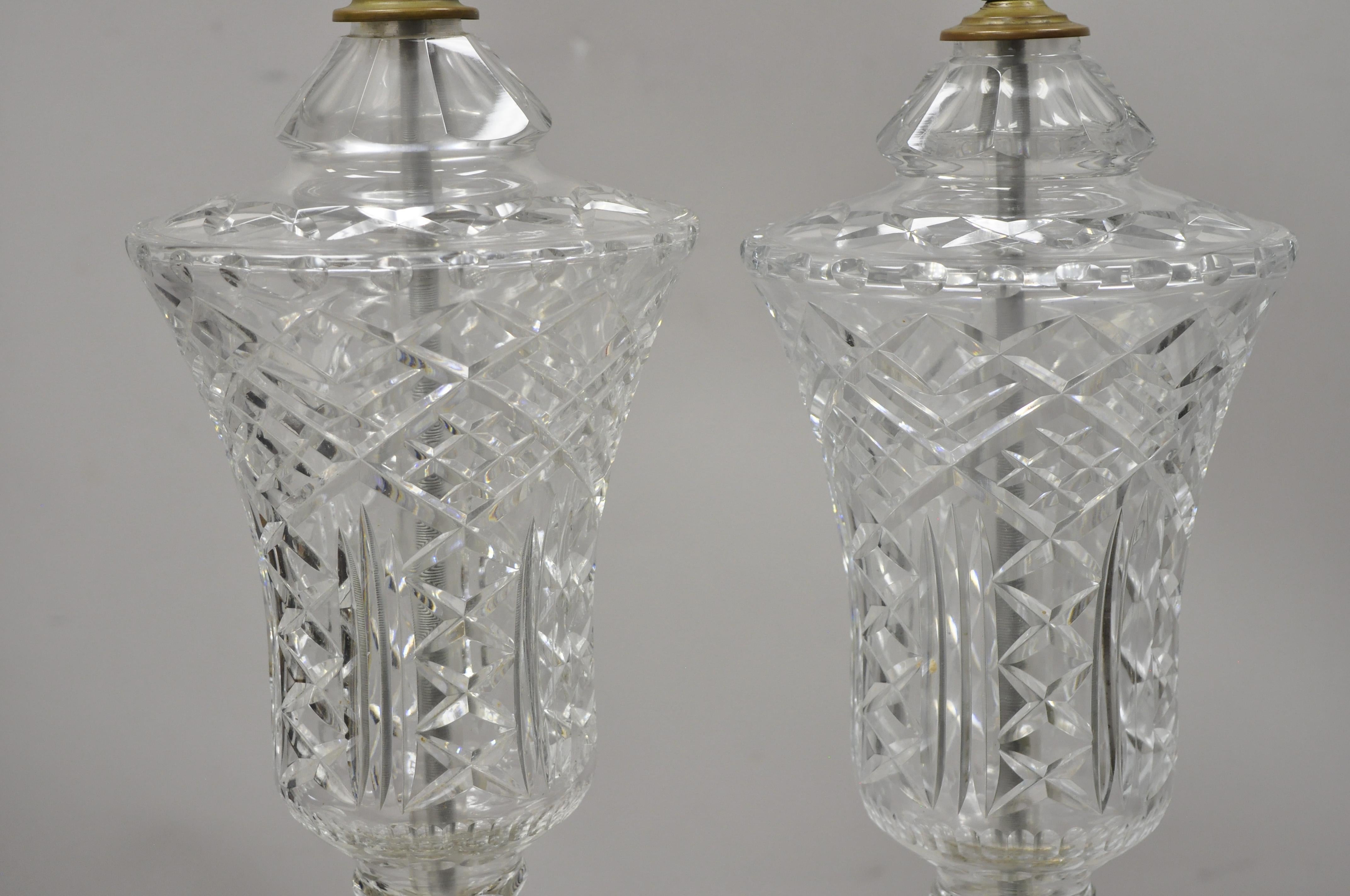 Antique cut crystal glass urn form body brass base Victorian table lamp, a pair. Item features cut crystal glass urn form body, brass base, very nice antique pair, great style and form, circa early 1900s. Measurements: 34