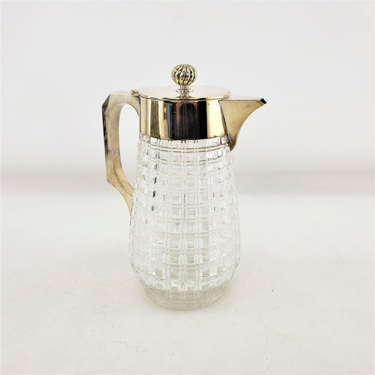https://a.1stdibscdn.com/antique-cut-crystal-silver-plated-claret-jug-or-decanter-with-chiller-insert-for-sale-picture-4/f_13552/f_339867721682487409960/20230418_144319_2__master.jpg?width=768