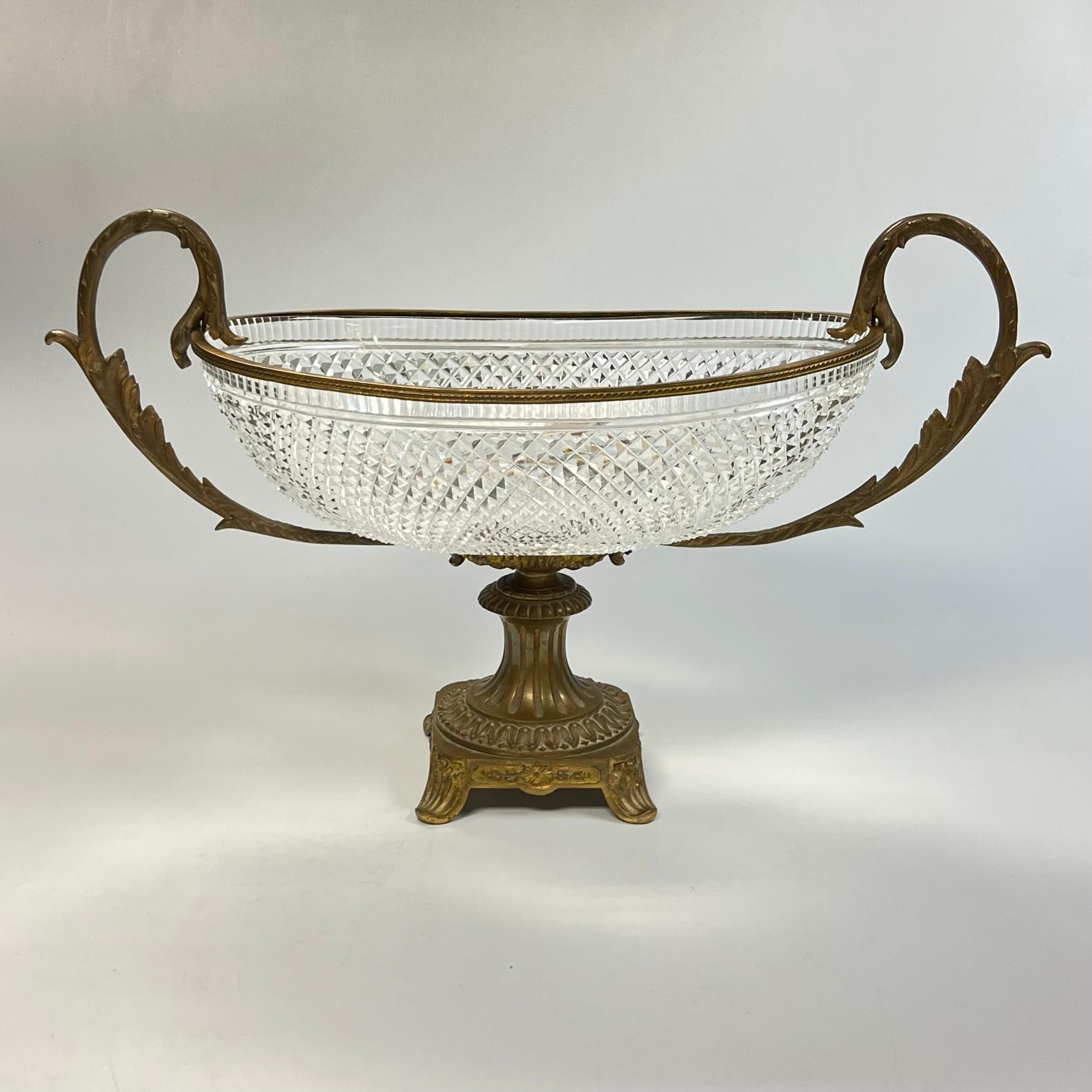 Antique (early 20th century) French cut glass centerpiece bowl of the highest quality with bronze mounts in the style of Baccarat.  Apparently unsigned.  Very good condition.