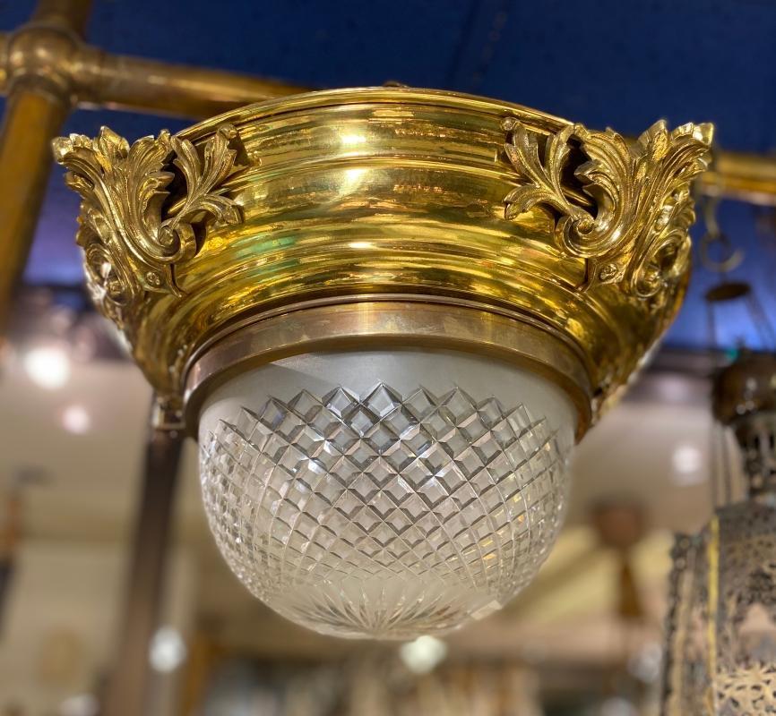 Antiques gilt brass coupe form chandelier with cut glass shade and finely cast acanthus leave motif.