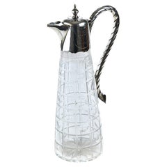 Pichet à claret antique en verre taillé et monté en métal argenté
