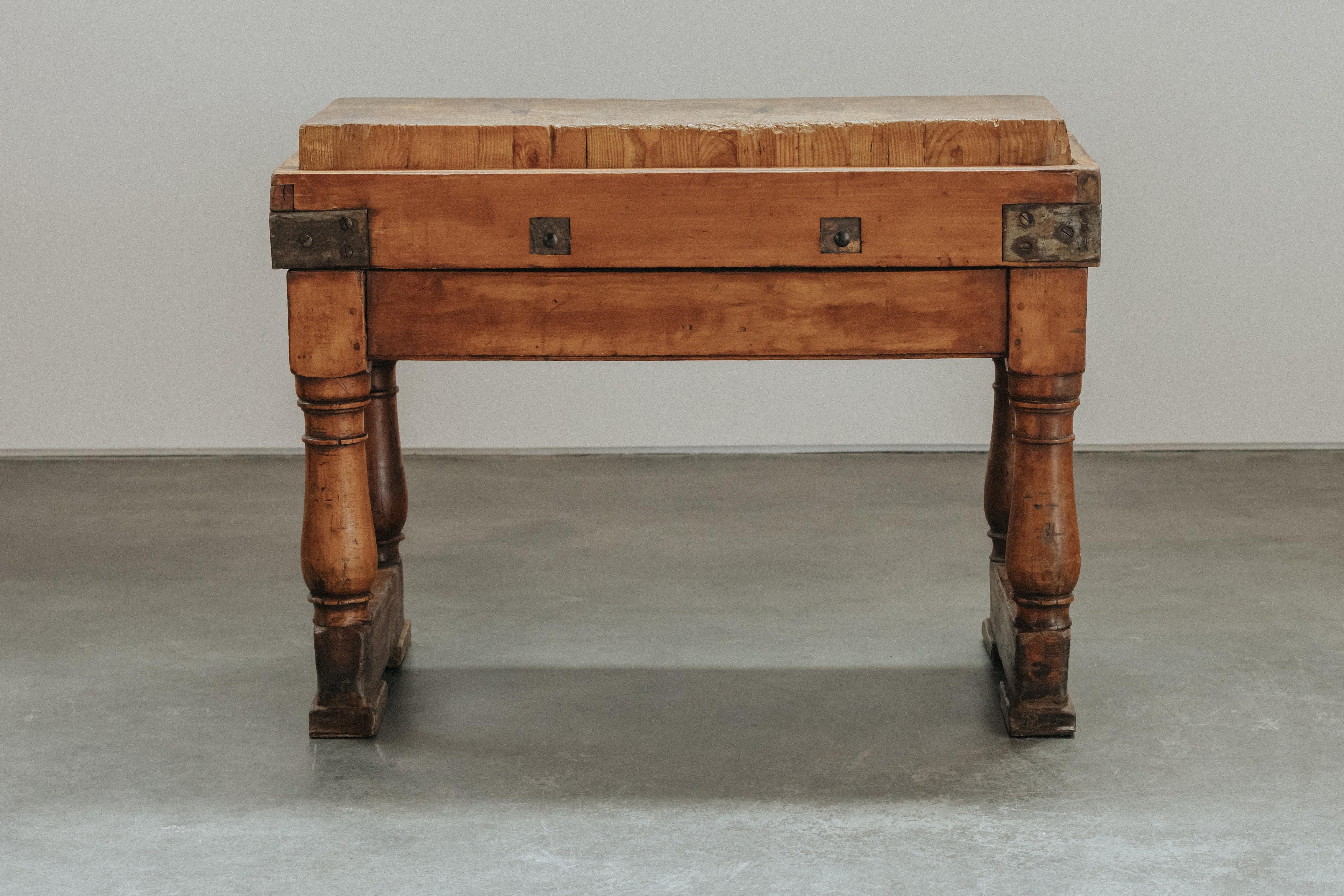 Antique Cutting Board Table From Switzerland, Circa 1920.  Clean and refined model with baluster legs and metal detail.  Excellent condition.