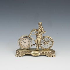 Antique Cycling Clock in Brass