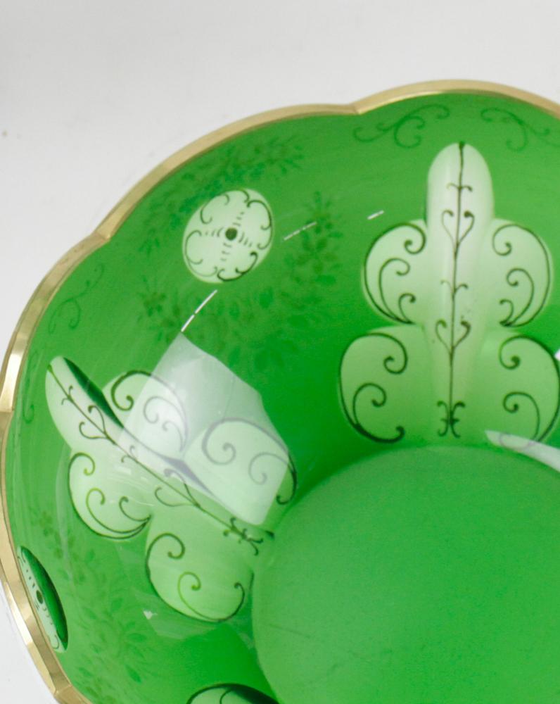 
Antique Czech Bohemian GreenGlass Crystal Lusters and Matching Bowl

These are a lovely pair of apple green glass Bohemian lusters with cut overlay, decorated with leaves and flowers hand painted in excellent condition, with normal wear to the gold