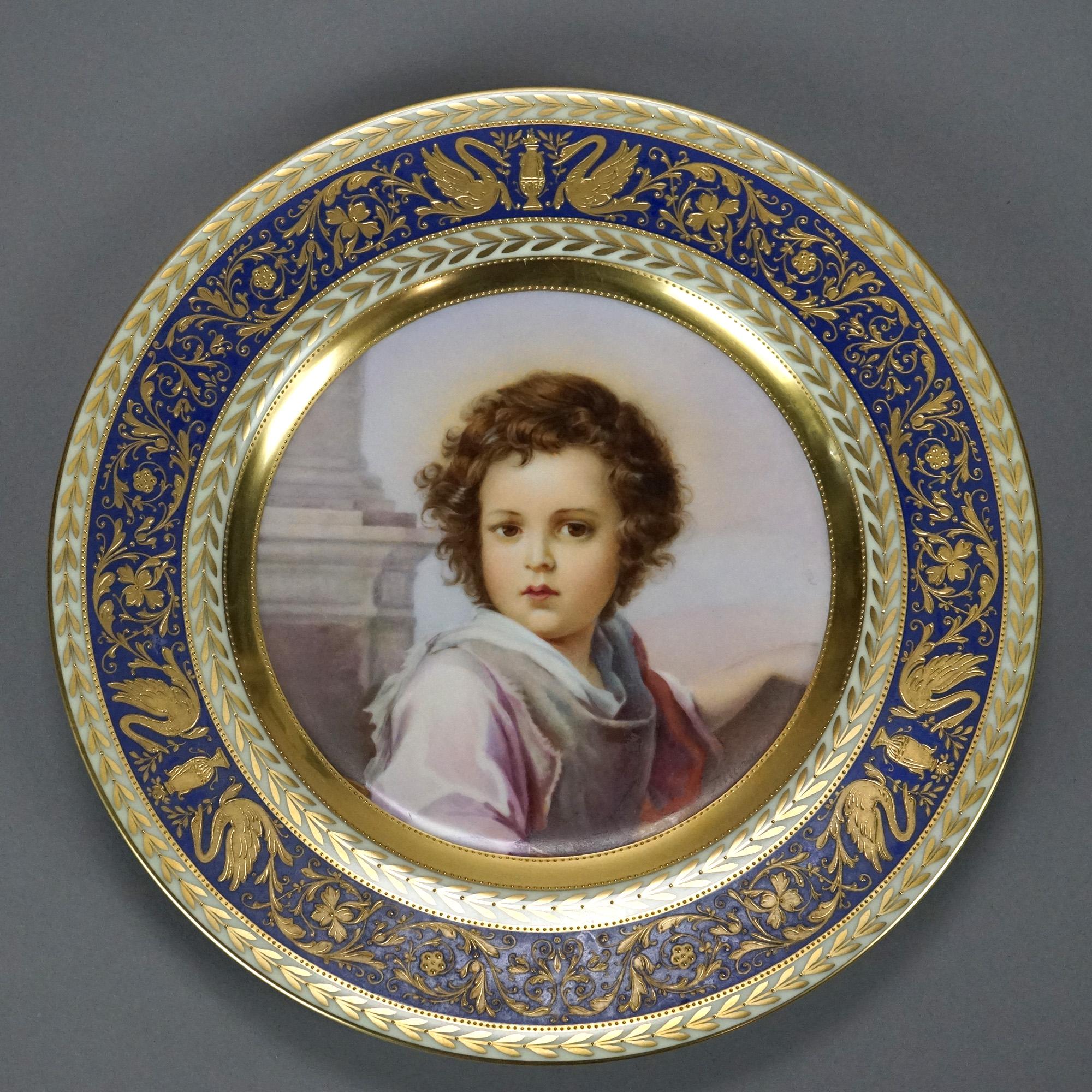 An antique Czech Royal Vienna School plate by Pirken Hammer offers porcelain construction with central portrait and gilt decorated surround, en verso maker mark and 