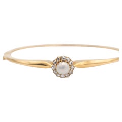 Bracelet jonc marguerite ancien avec demi-perle et diamants, début du 20e siècle, Suède.