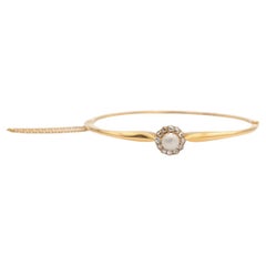 Antique Daisy Bangle With Half-pearl and Diamonds, early 20th century, Sweden.