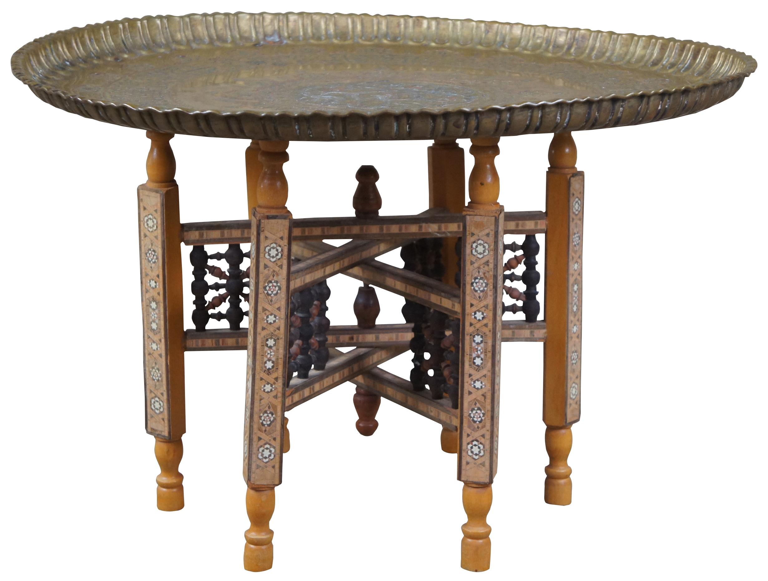 Antique Damascus tray table. Features an etched caligraphy tray with copper accents. The tray is supported by a micromosaic folding base with bone inlay and spool turnings.
   