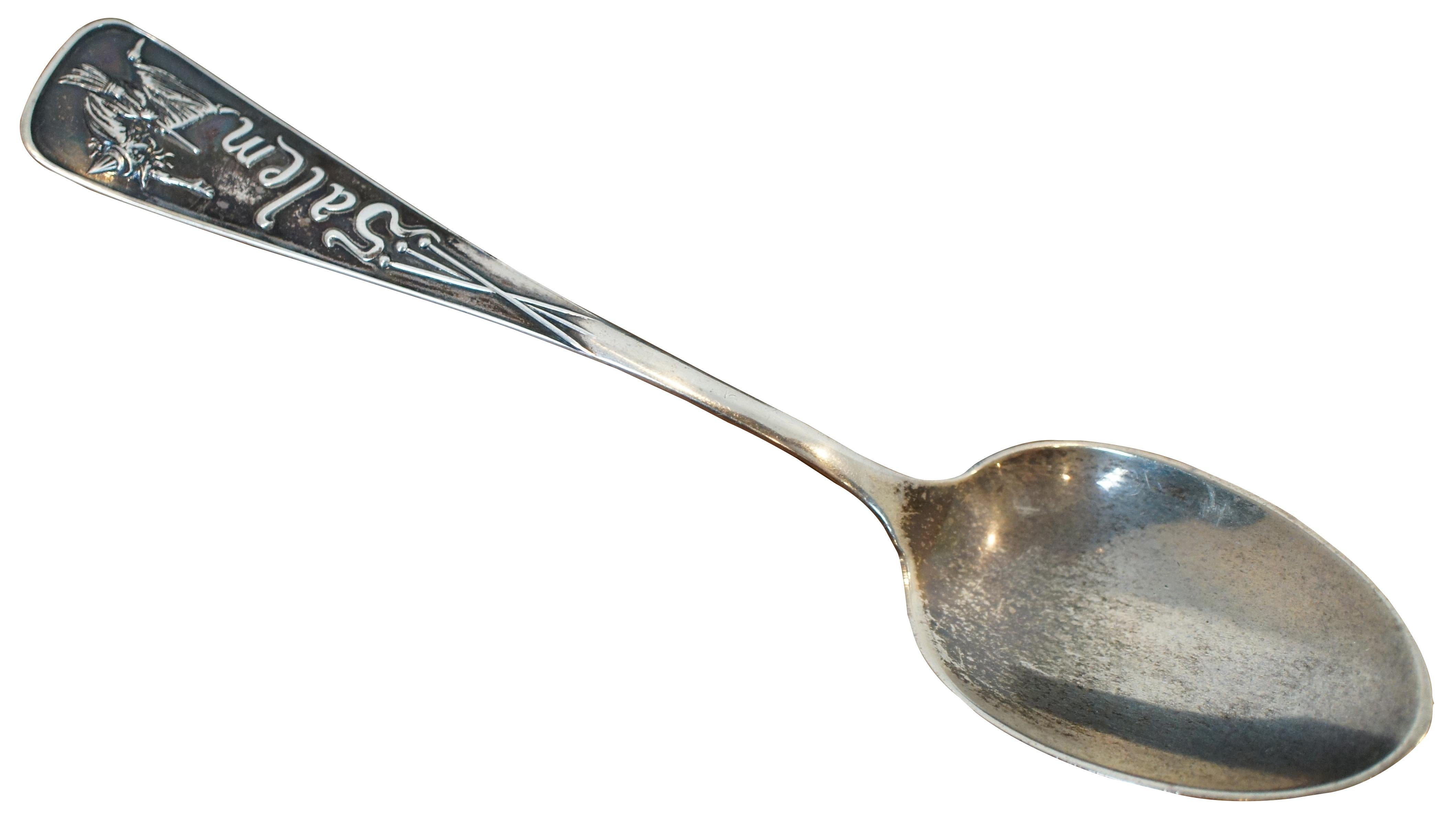 Antique late 19th century Durgin sterling silver Salem Witch souvenir spoon, sold by Daniel Low & Company. This spoon sports a simple squared off handle decorated with the word Salem flnanked by three pins and a witch holding a broomstick. “On a