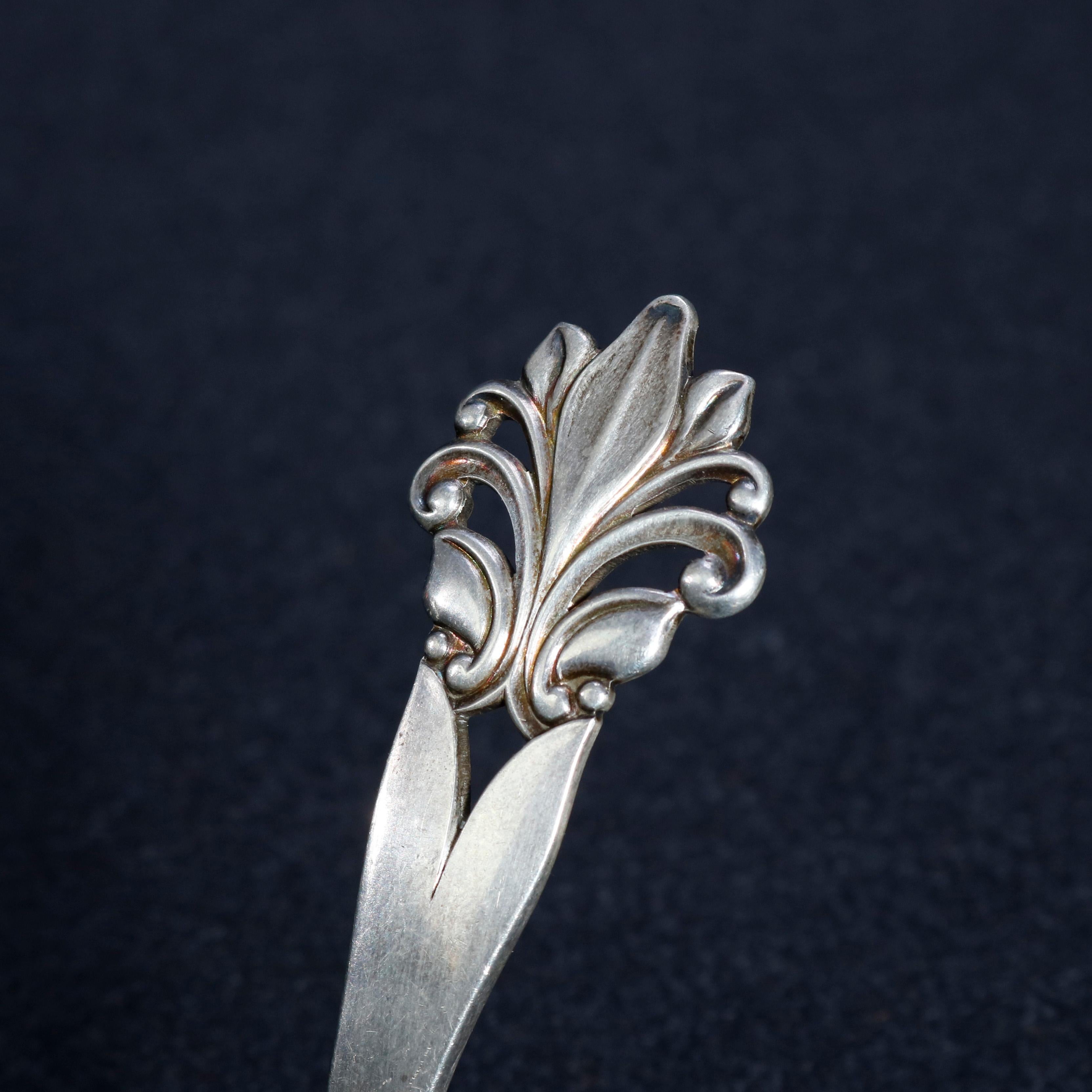 An antique Danish Arts & Crafts sterling silver pie server by Georg Jensen offers pierced handle terminating in a palmette finial, signed en verso on handle, circa 1920

***DELIVERY NOTICE – Due to COVID-19 we are employing NO-CONTACT PRACTICES in