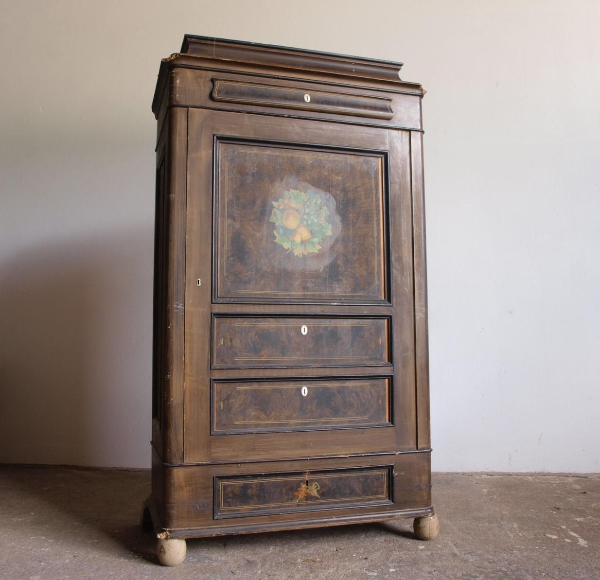 This exquisite antique cabinet, a classic 'karlekammerskab,' hailing from Denmark and dating back to the late 1800s or early 1900s. This remarkable piece boasts the original patina that time has bestowed upon it, a testament to its enduring beauty.