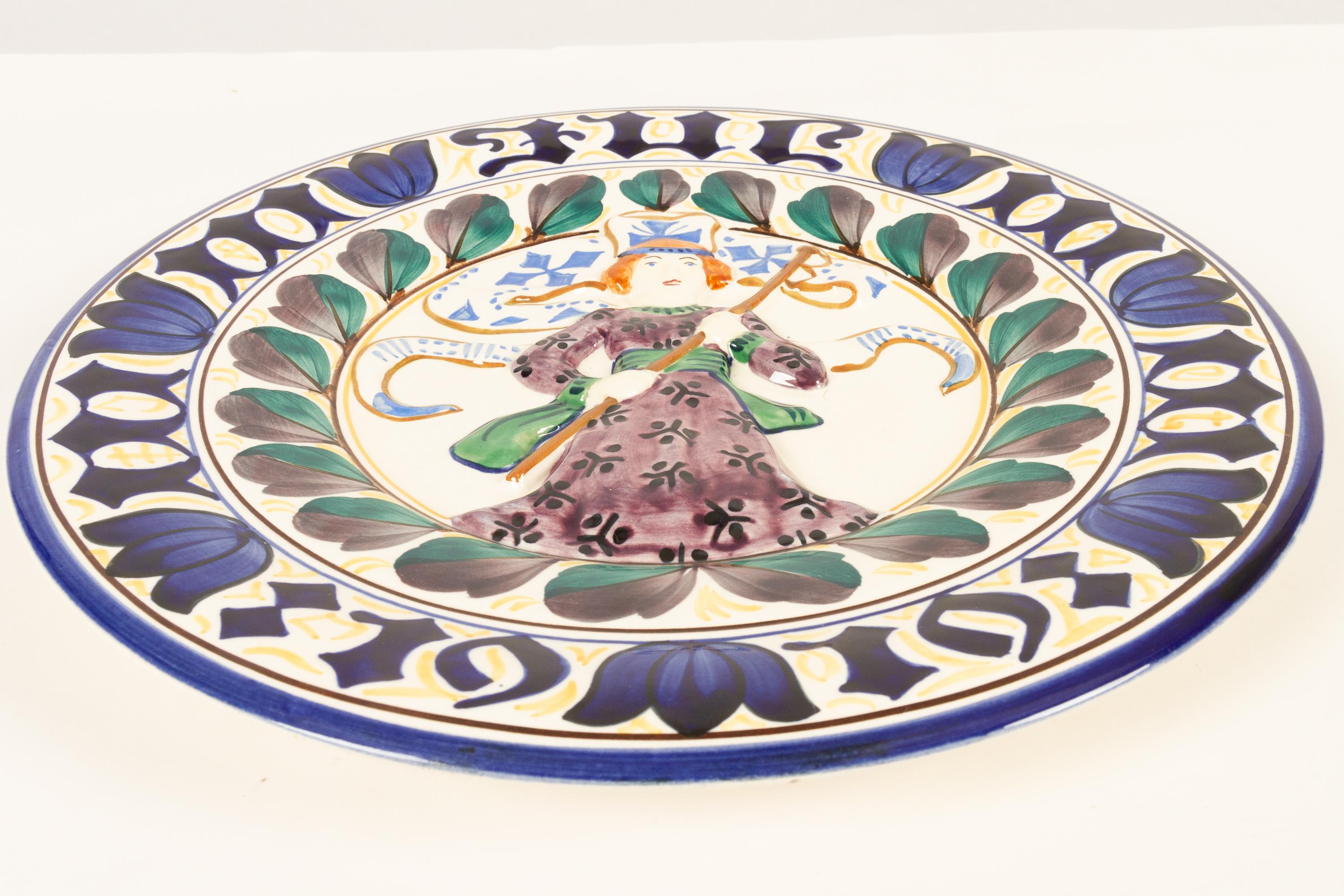 Antique Danish Christmas porcelain decorative plate by Aluminia, 1919.
Large Christmas plate by Aluminia (later Royal Copenhagen) in hand painted faience. The word 
