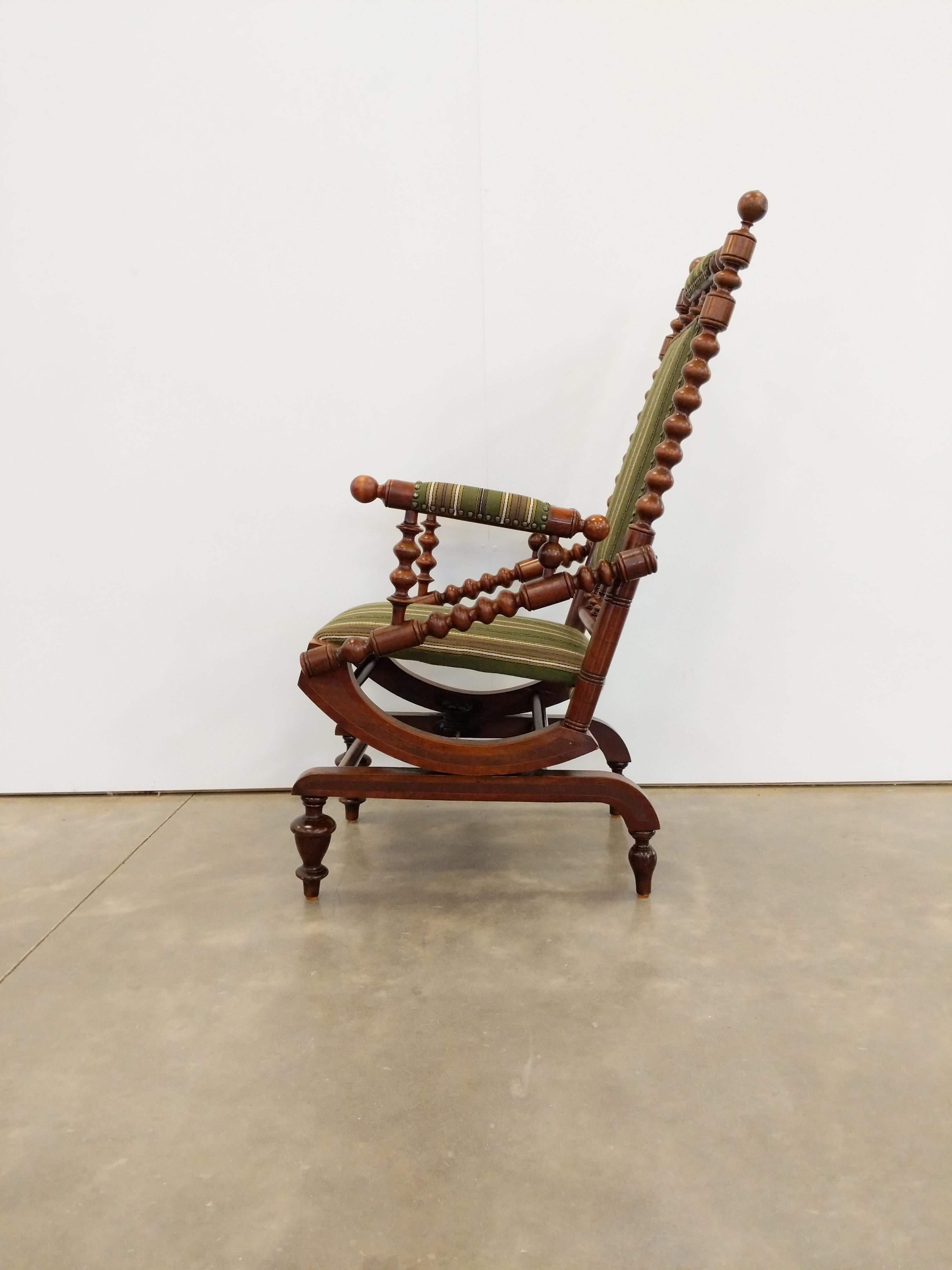 Authentic antique Danish rocking chair.

This chair is in excellent overall condition with few signs of age-related wear (see photos).

If you would like any additional details, please contact us.

Dimensions:
44.25” tall to back
18” tall to