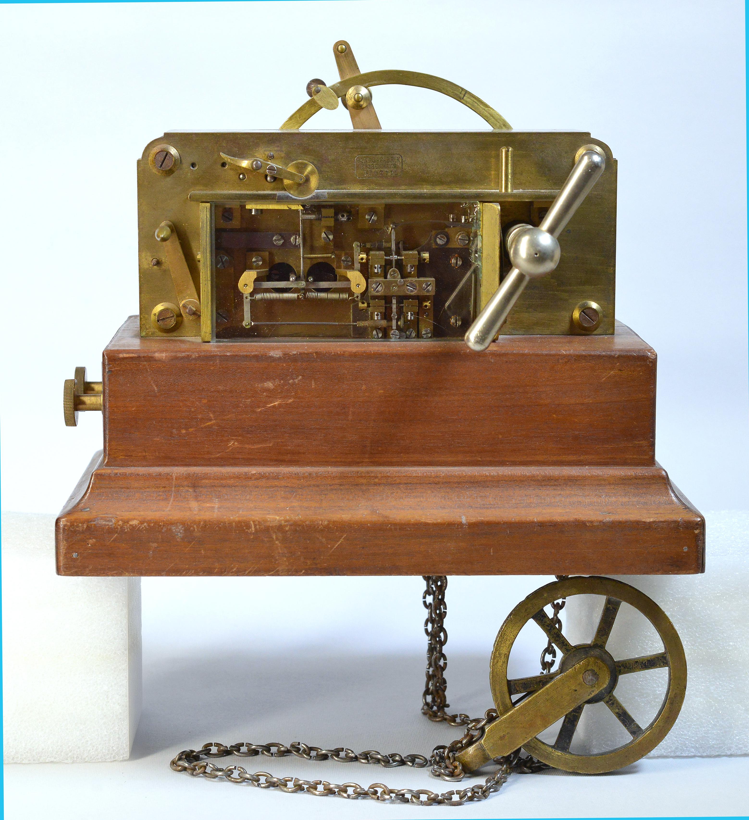 The telegraph apparatus made in late 19th century and was driven by weight on chain like Old Father clock.
The brass and steel instrument is state of the art creation by legendary Danish engineers. Register serial 52771. Size app.: 19 cm high (7”)