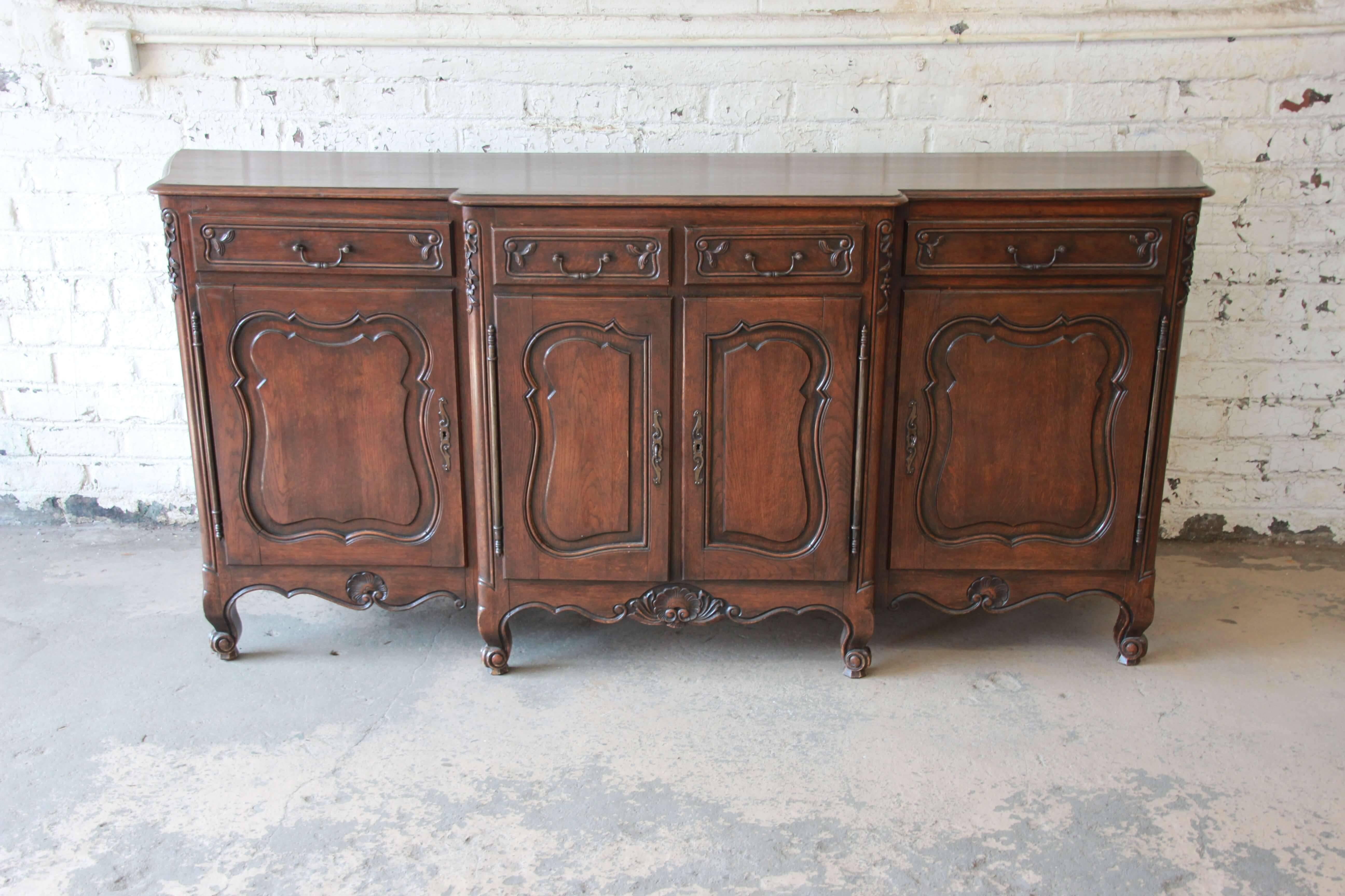 Offering a very nice and monumental antique 19th Century French sideboard. The sideboard measures almost 89