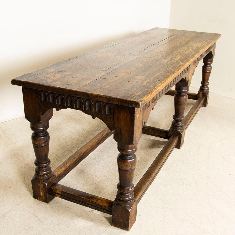 19th Century Antique Dark Oak Refectory Library Table with Decoratively Carved Skirt from Swe