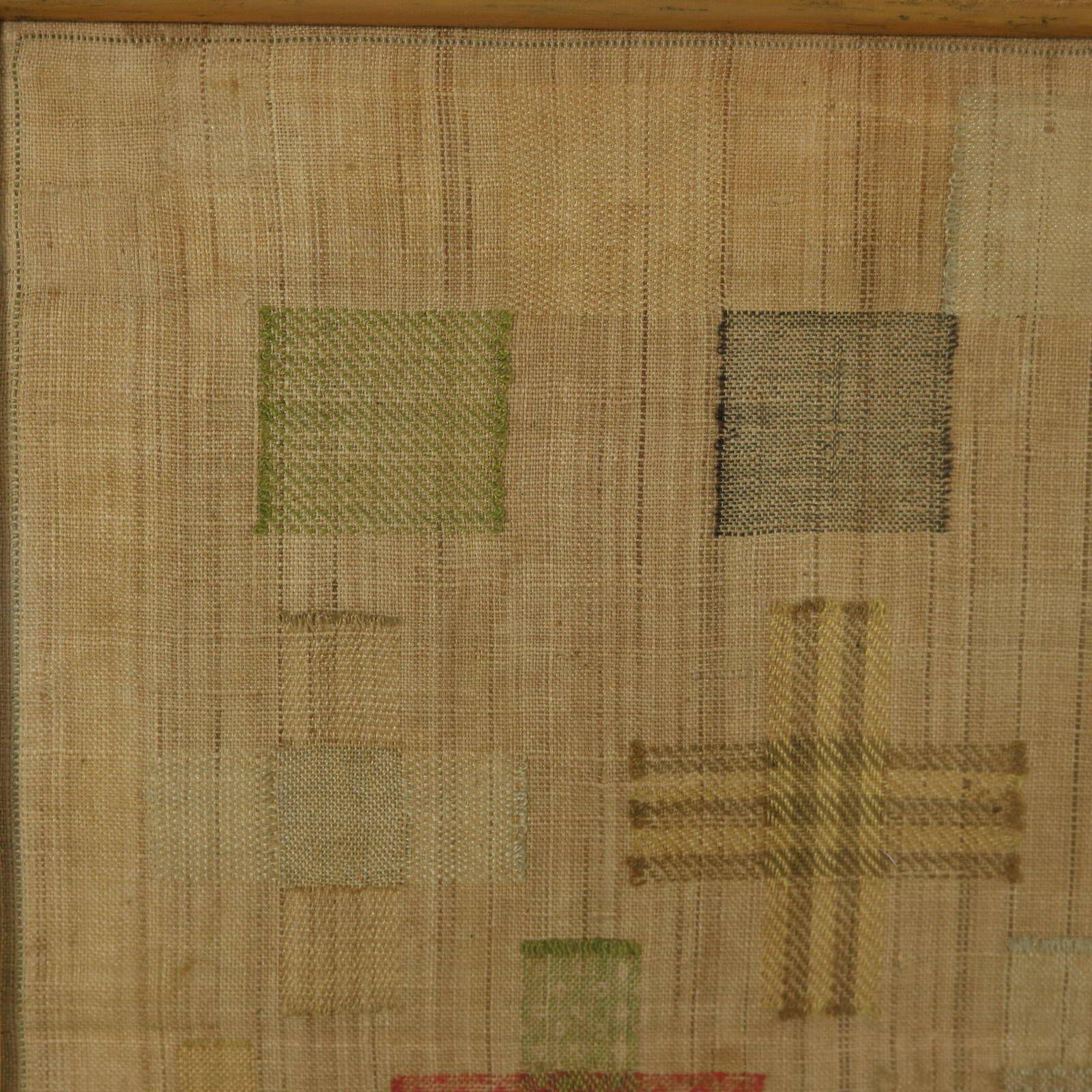 Antique Darning Sampler, 1791, by Ann Manning. The sampler is worked in silk threads on a linen ground, in a variety of stitches. Comprises of 15 darning panels, worked in various different techniques and patterns. Colours red, yellow, dark brown,