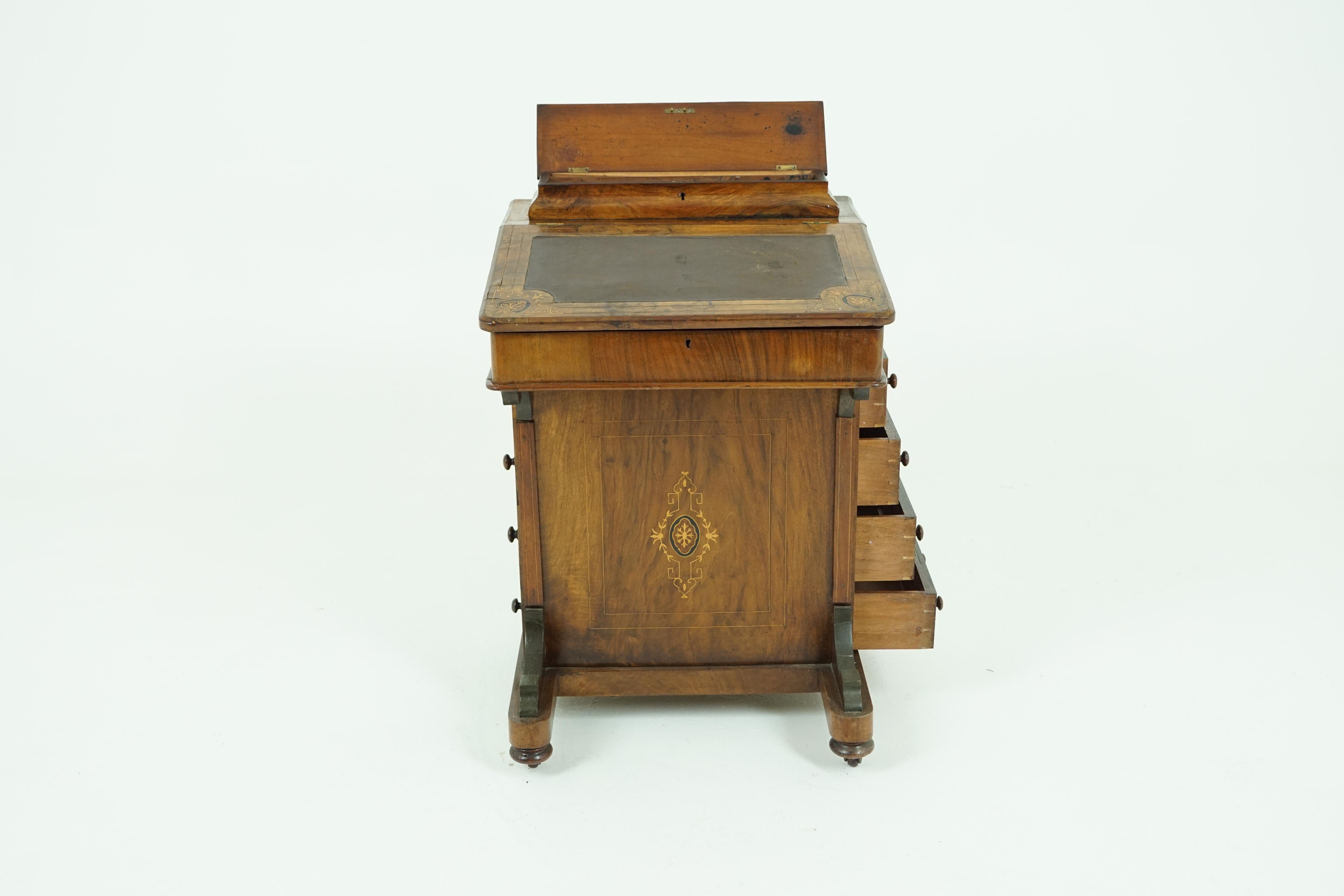 Scotland 1870
Solid walnut and Veneers
Inlaid lift top with storage space beneath
Brown leather insert at the top
Opens to reveal pigeon holes
Inkwell holders
Some scuff to the back of lid
Four dovetailed drawers with original knobs to the