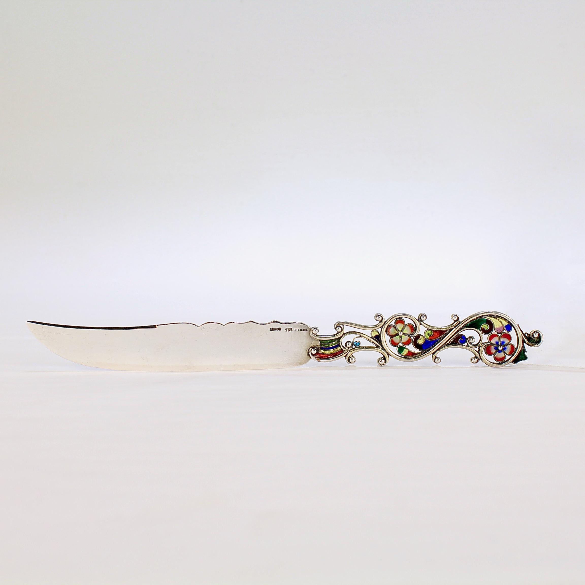 A fine antique letter opener or knife by David Andersen.

In sterling silver with plique a jour enamel decoration to the handle.

Simply a wonderful piece of silver in the Russian or Baltic taste!

Date:
Early 20th Century

Overall Condition:
It is