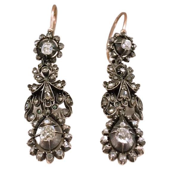 Antique rose cut diamond earrings in day and night style earrings are adjustable to use for day wear and evening with estimate diamond weight of 1.5 carats 14k gold topped with oxdized silver colour hall marked 56 imperial russian gold standard for