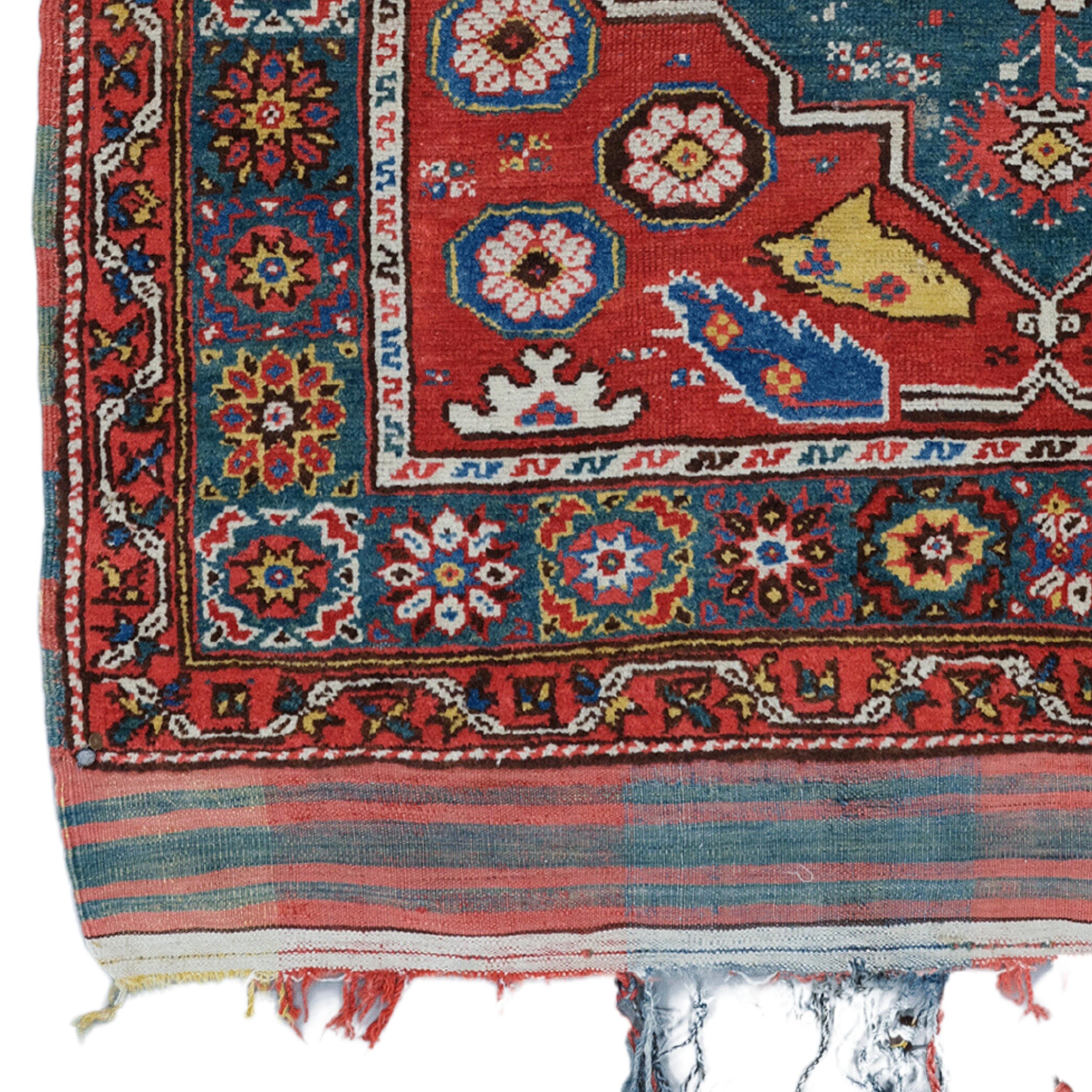 This Turkish Dazkiri rug dates to the 19th century. It was made by a village weaver in the Menderes River area of southwestern Anatolia.

The striking design and colour combinations follow the classic format of Dazkırı rugs: a large green central
